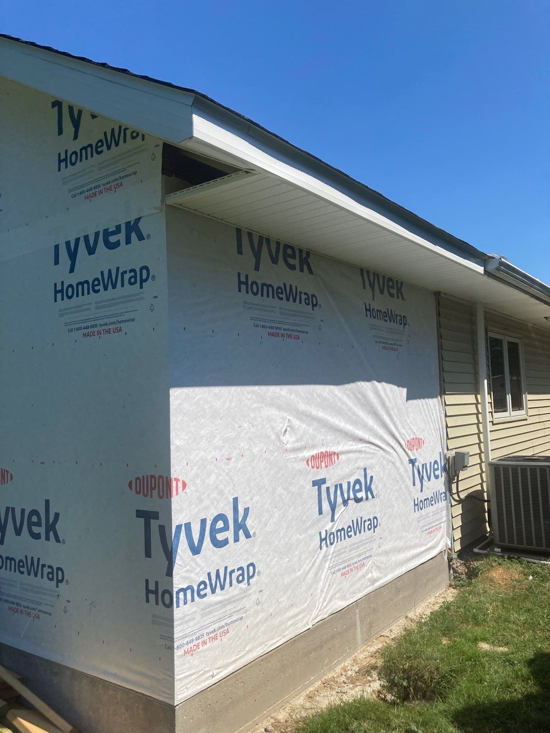 Gutter Installation using 5" Seamless Aluminum Gutters by Absolute Roofing and Construction
