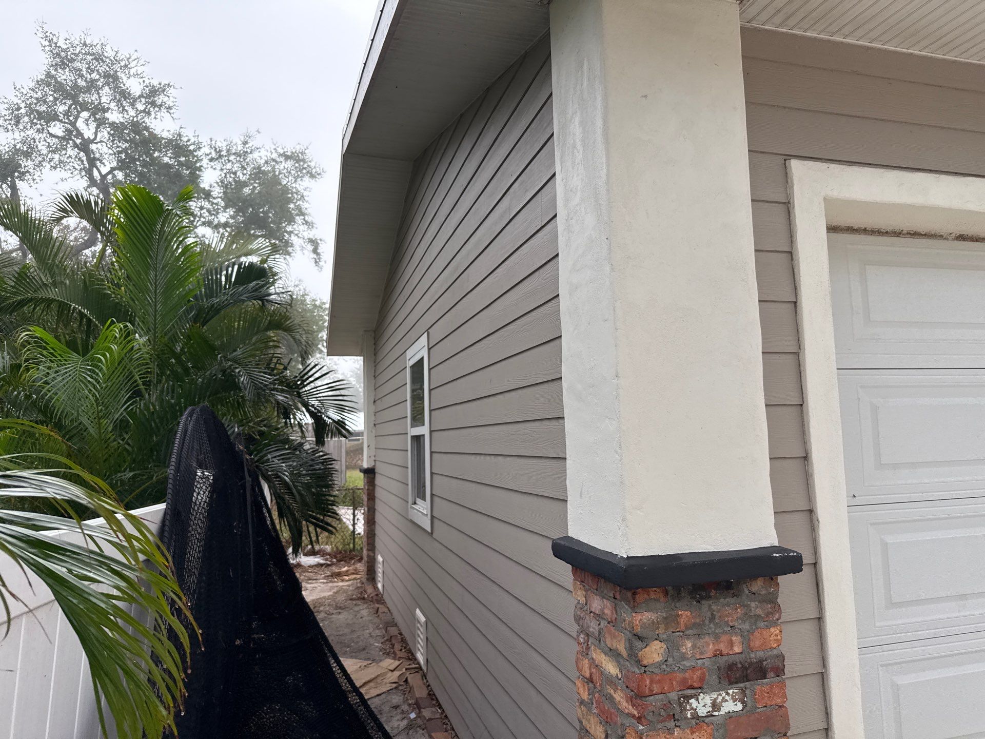 2-Story House Wash and Garage Pressure Washing in Palmetto, FL by Sunshine AquaWash
