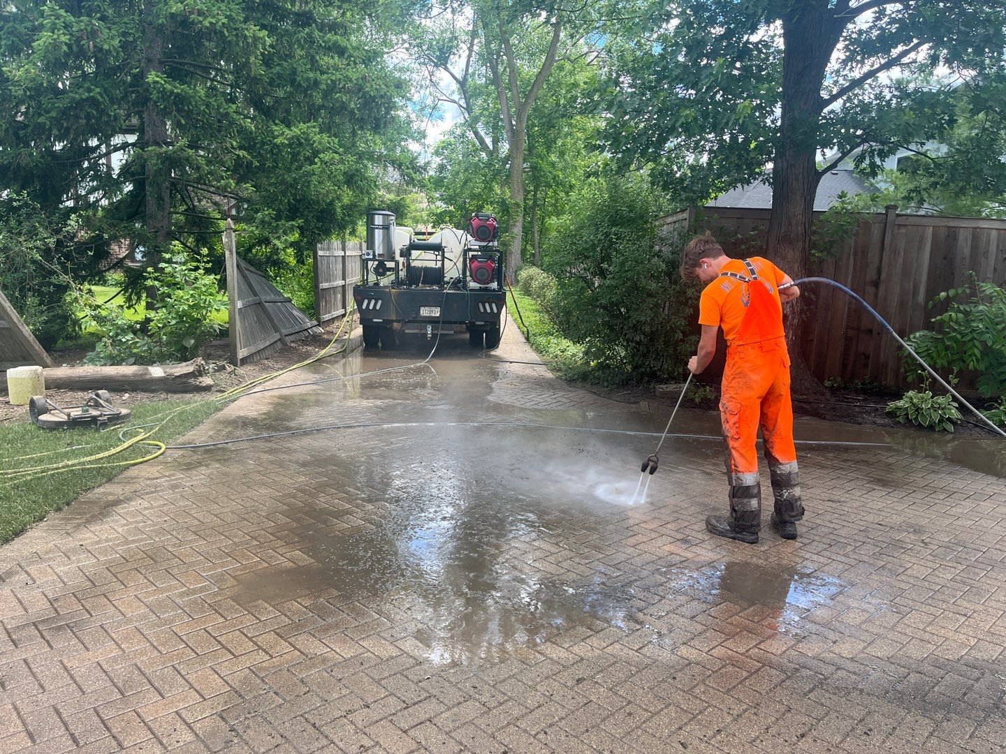 Brick paver repair, cleaning and sealing by Northern Power Washing LLC.