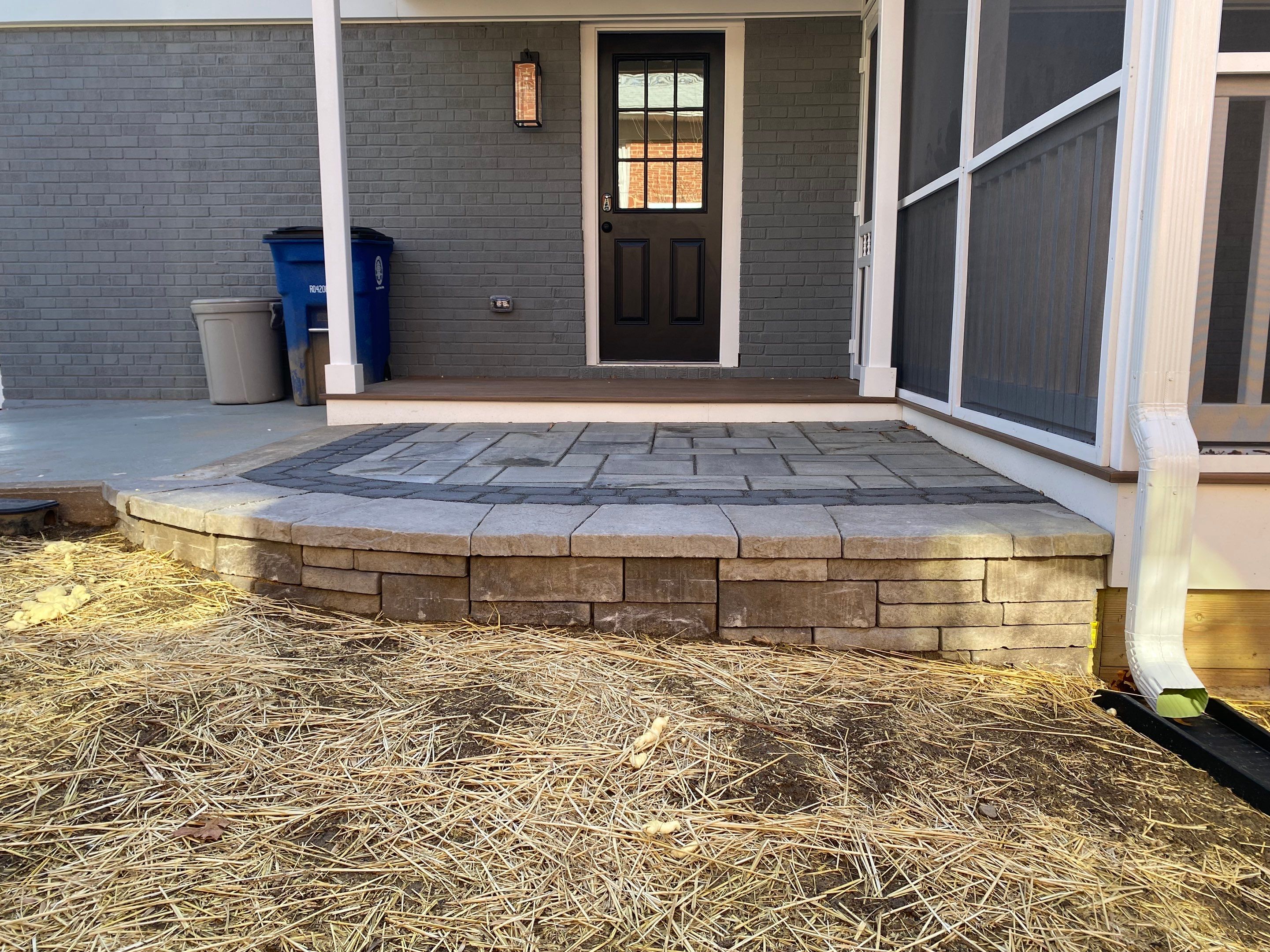 Retaining wall, walkway, small patio and landscape install by The Smet Companies, LLC