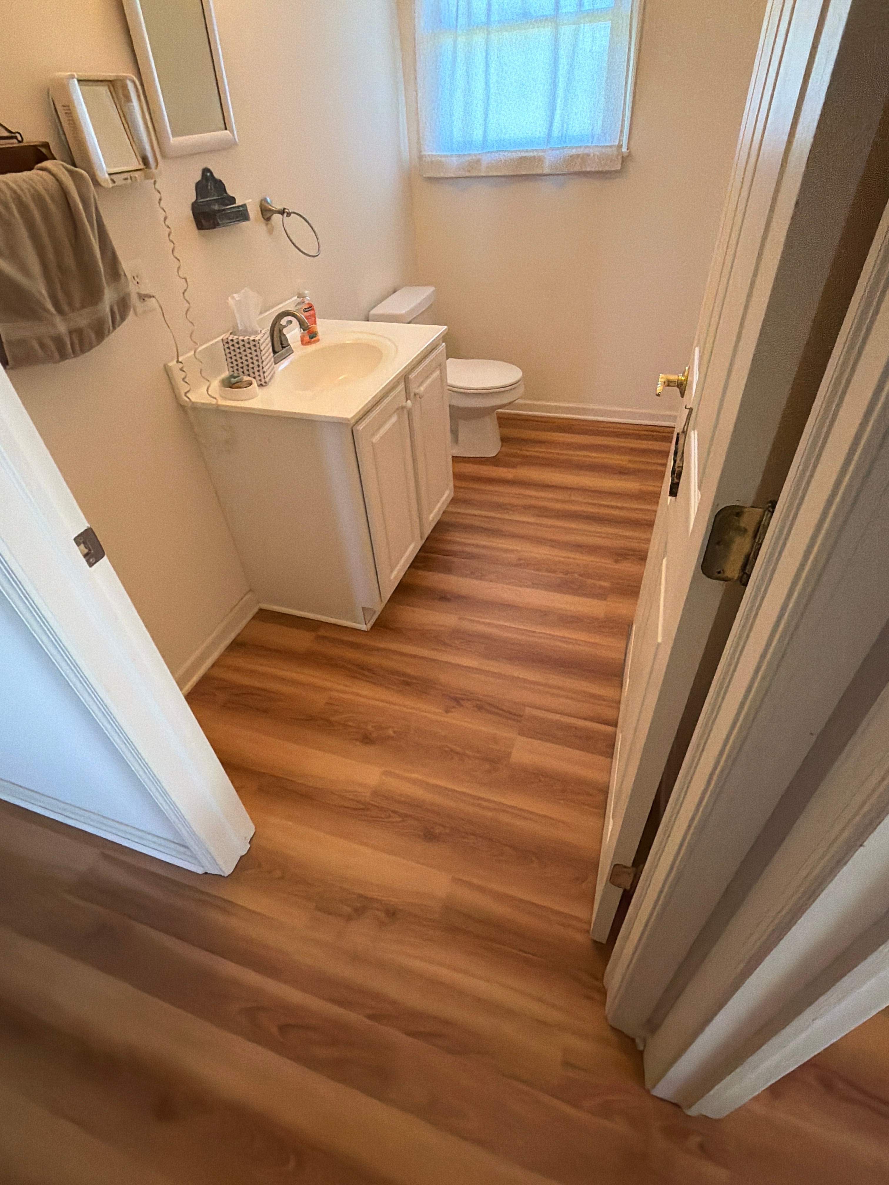 LVP Flooring Installation & Bathroom Flooring Upgrade by Laser Focused Solutions LLC