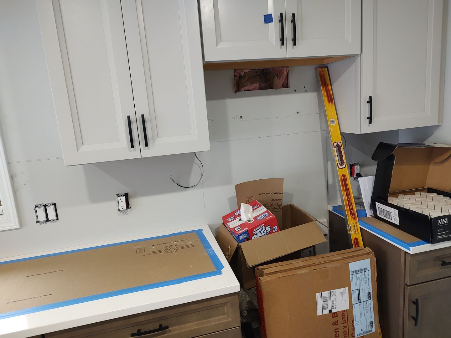 Interior Renovations, Kitchen Remodel, and Window Replacement by Ivy Lea Construction
