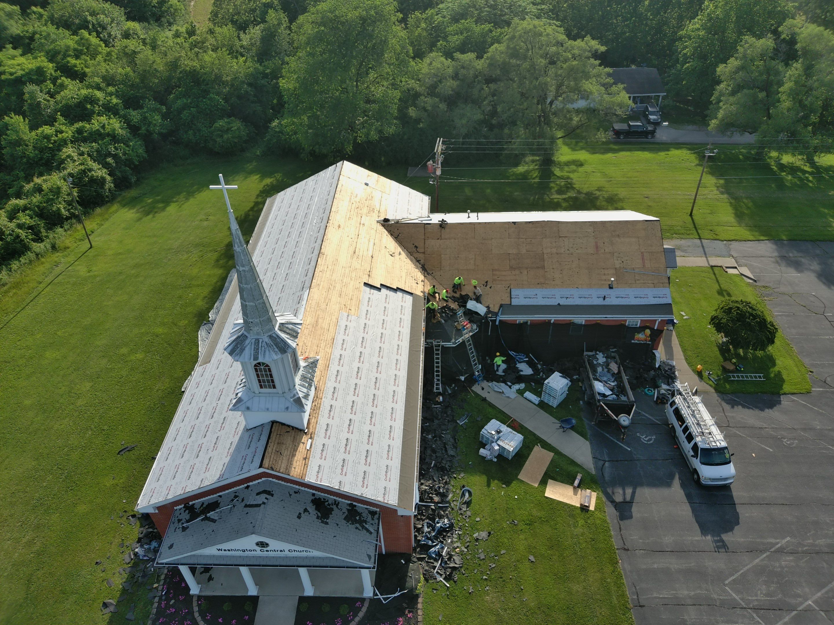Commercial Roofing Installation using Performance Shingles by Mr. Roofer