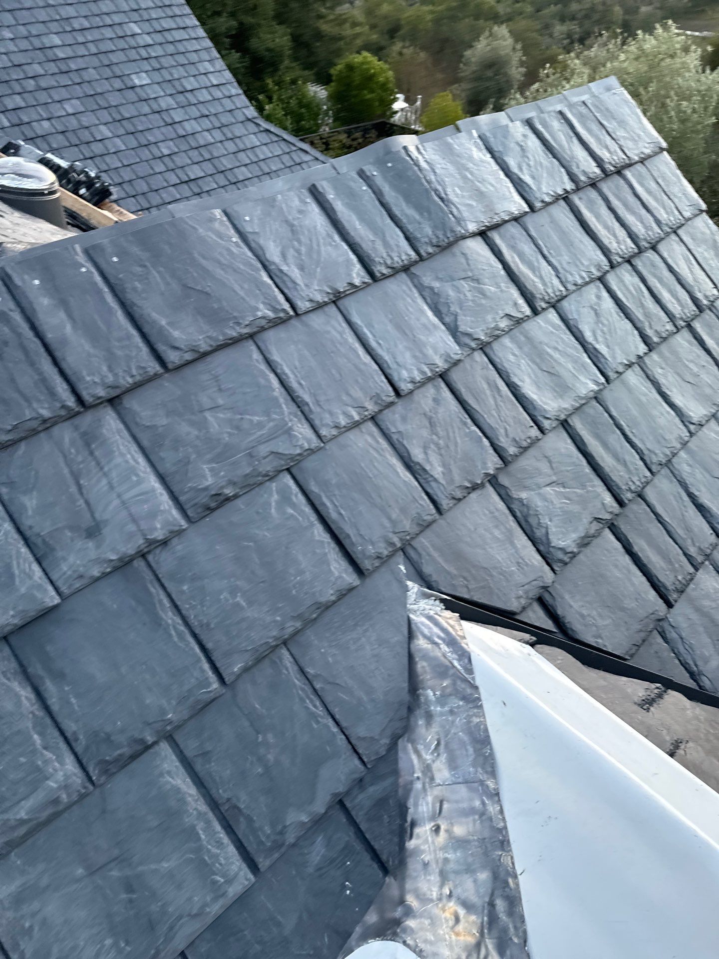 Residential Roofing Installation using Slate by Acker Roofing