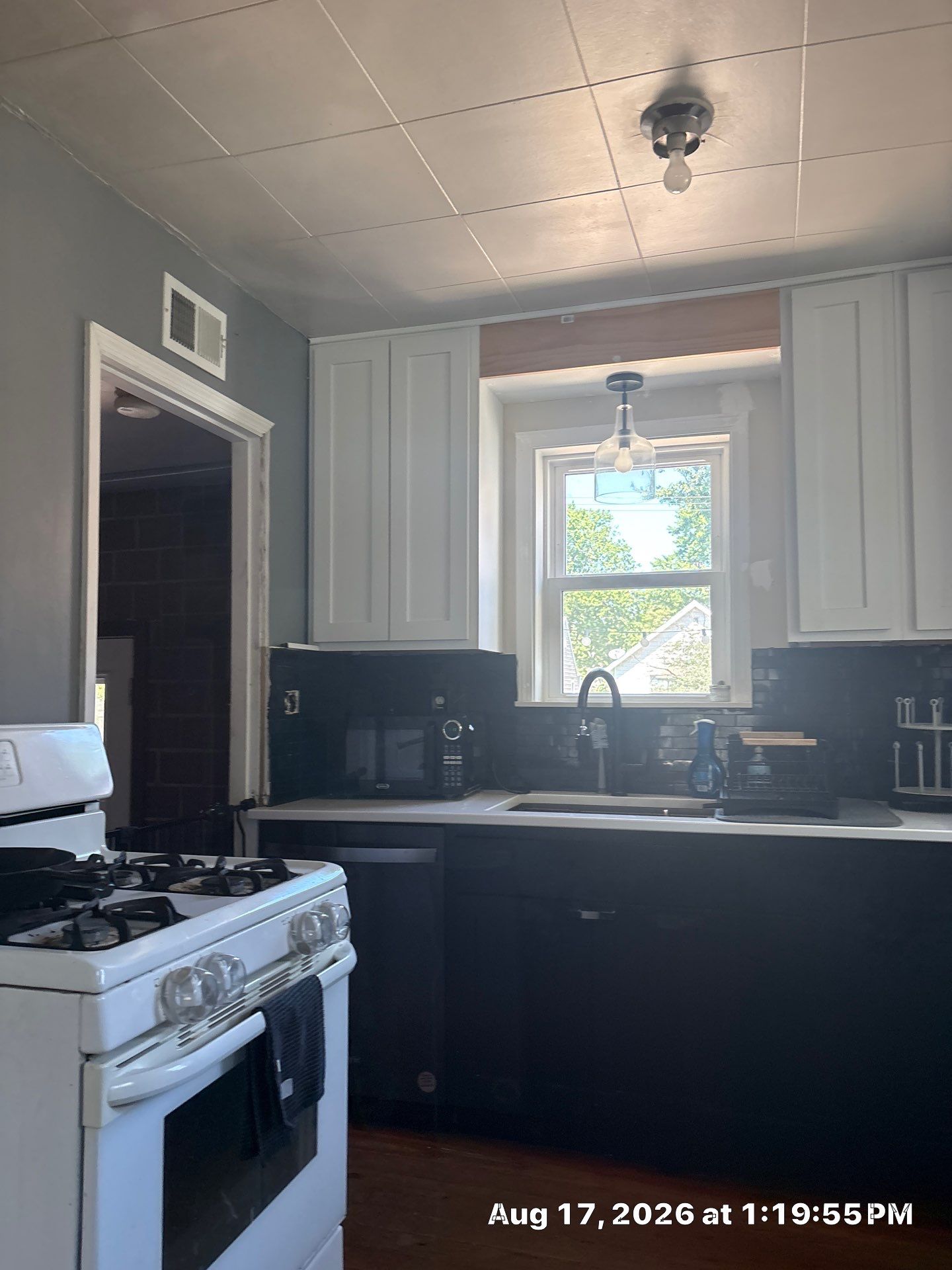 Modern Lincoln Kitchen Remodel with Two-Tone Cabinetry by CompanyCam Sales Demo