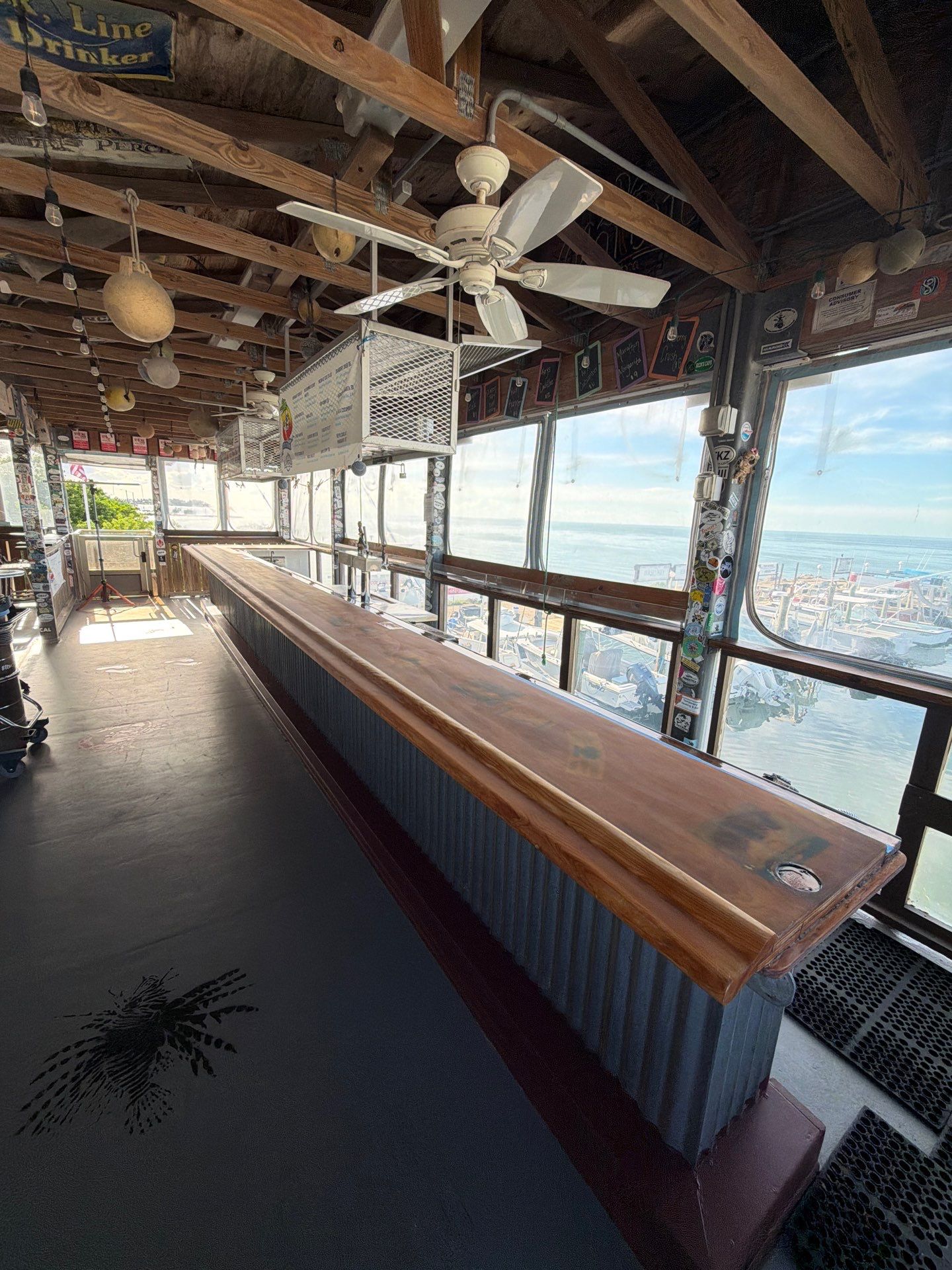LOCAL FAMOUS FL KEYS BAR REFINISH by Tropical Epoxy Coatings & Creations LLC 