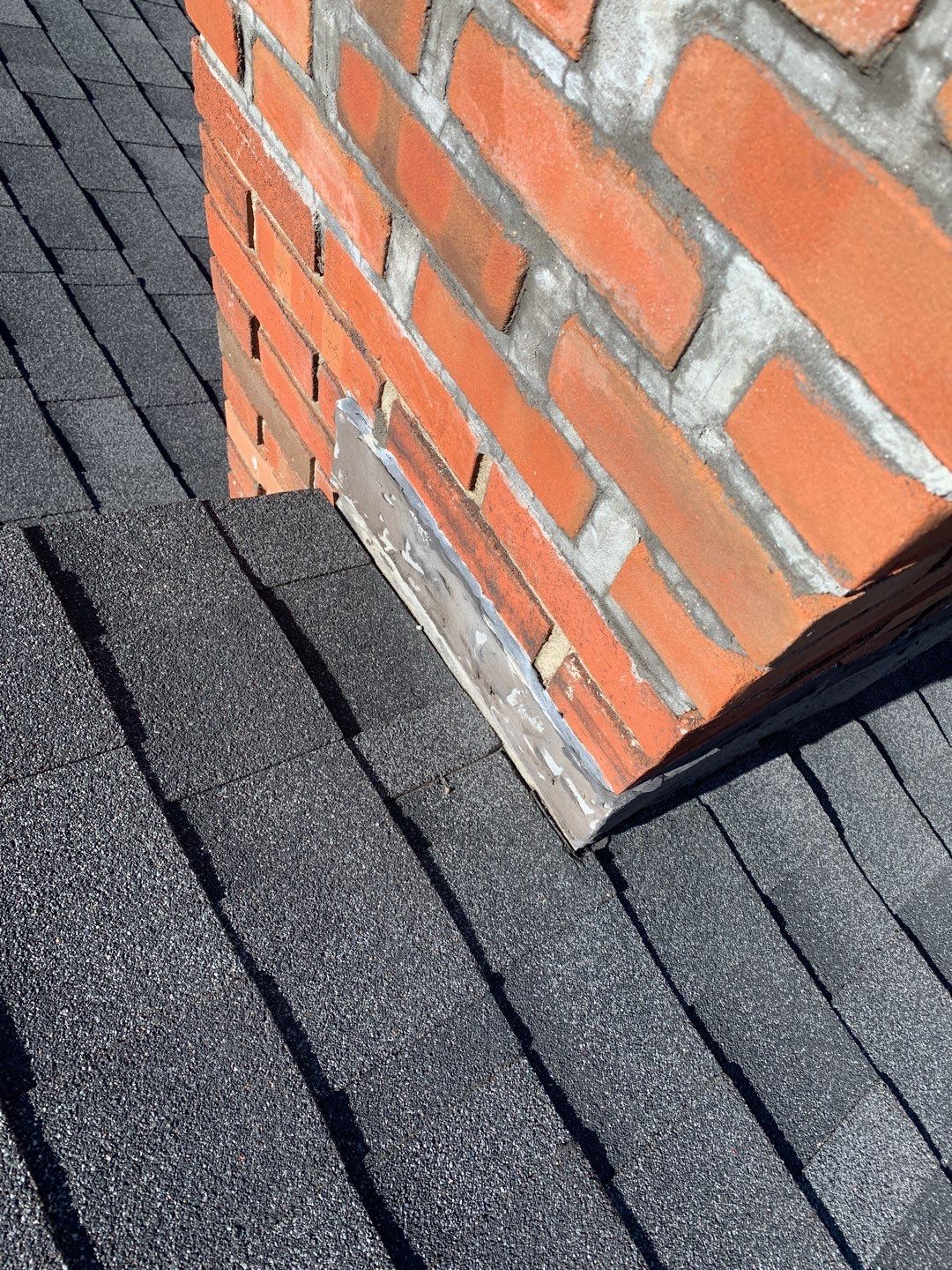 Residential Roofing Repair using Chimney Flashing by A Plus Exterior