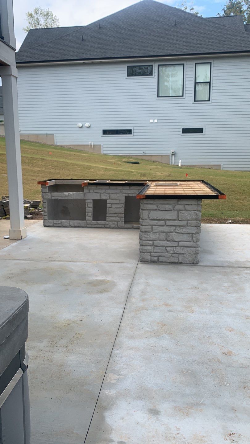 Outdoor Kitchen on Lake Keowee by Xtreme Concrete Services