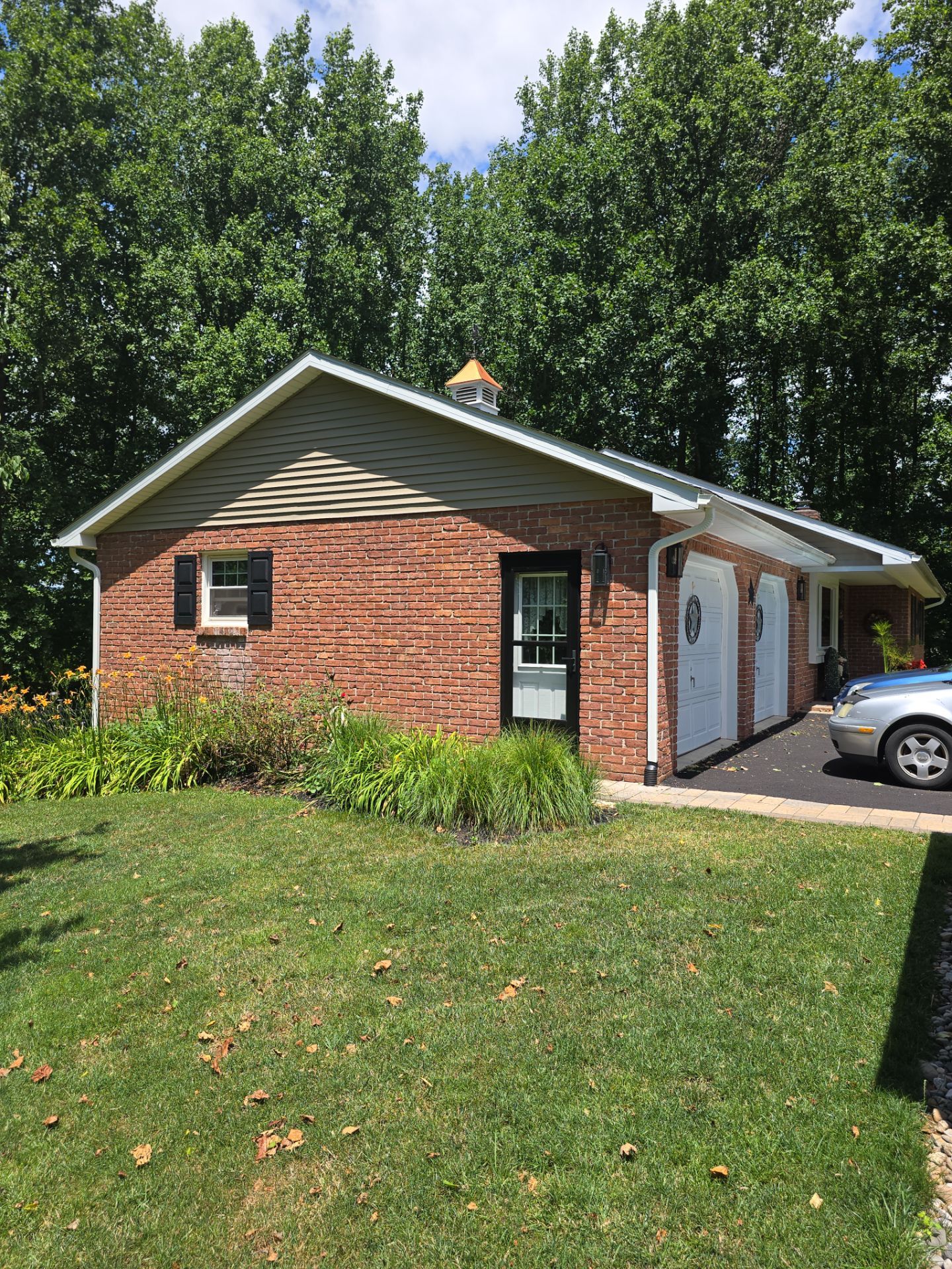 Sunroom addition and complete Exterior Remodel by Wyomissing Construction LLC