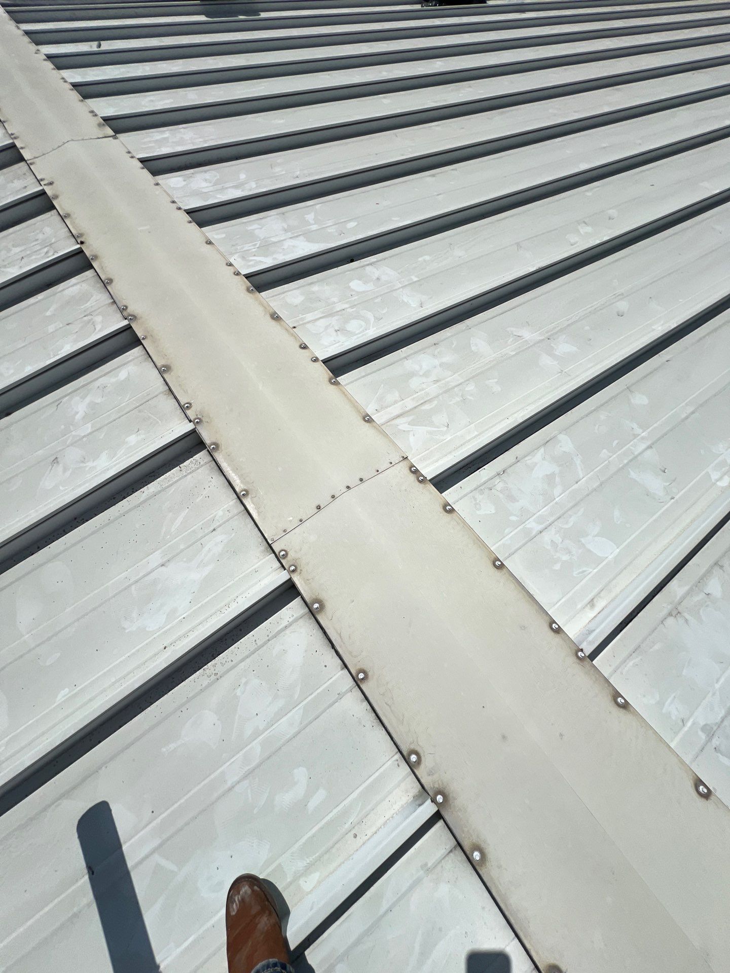Commercial Roofing Repair using Metal by Roof Repair Company