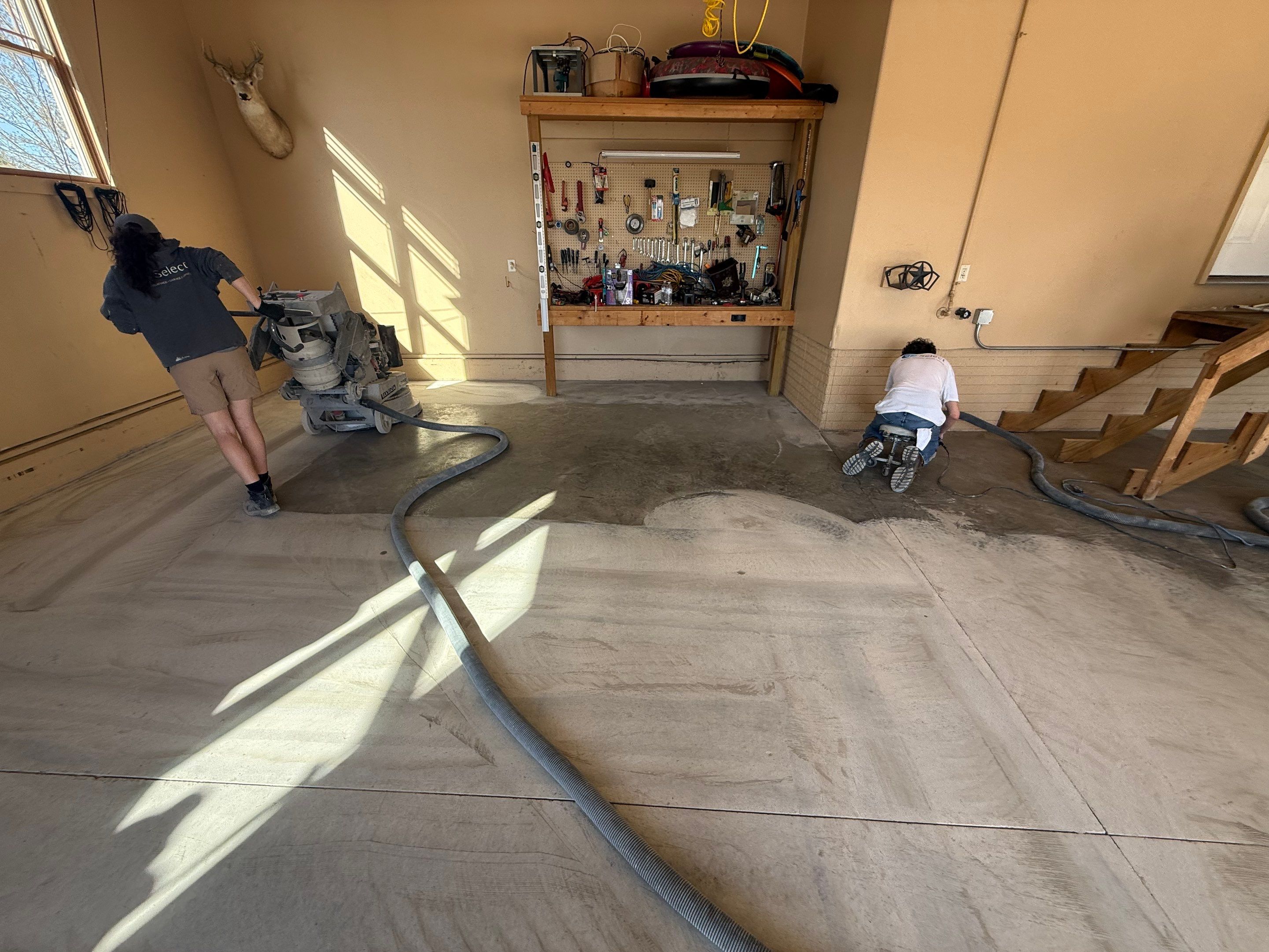 Residential Garage Floor Transformation with Speckled Epoxy Coating by Select Painting, Coatings & Garage Cabinets