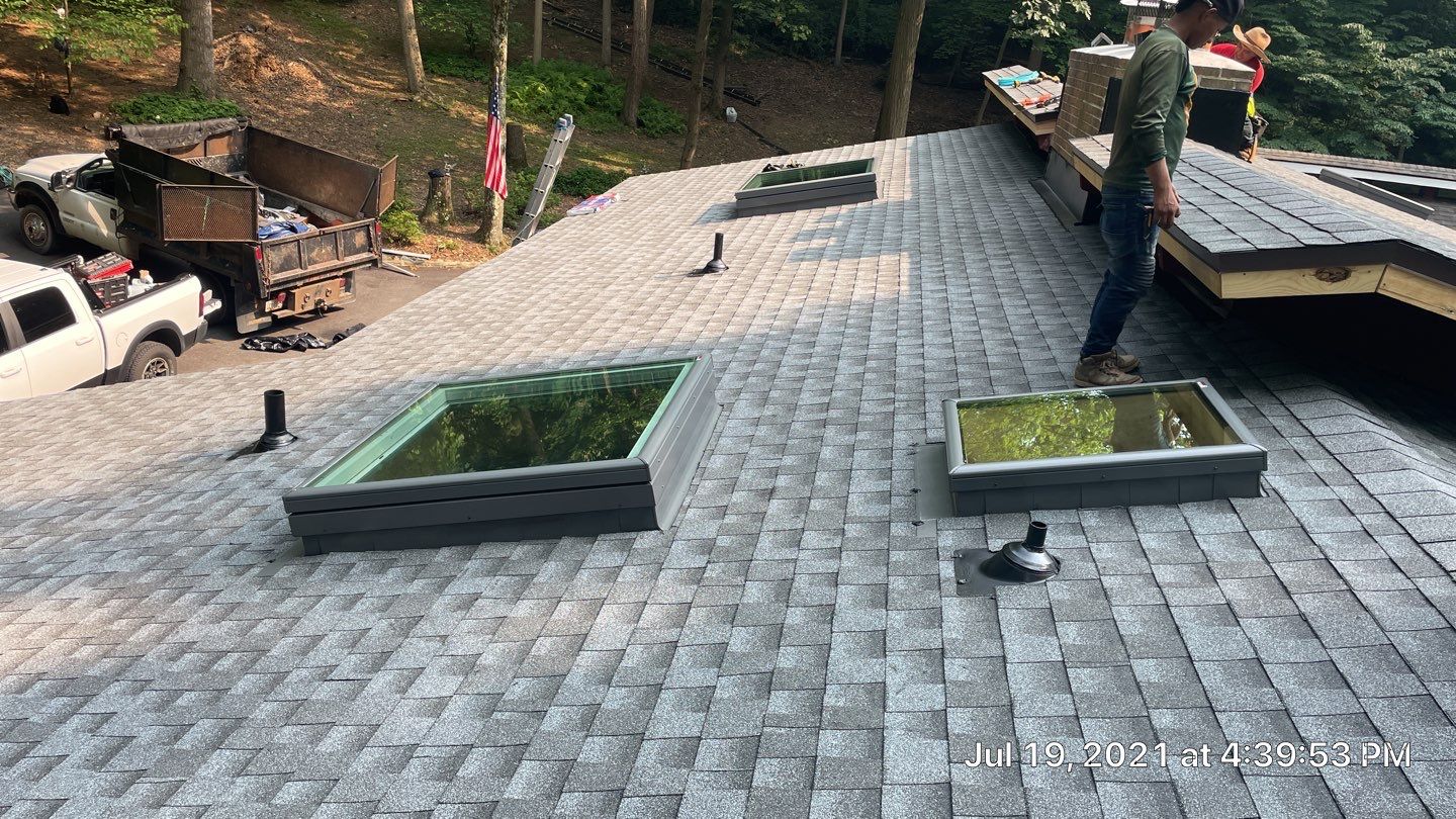 Deckhouse Roof Replacement by American Home Contractors
