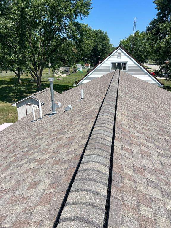 Residential Roofing Repair using Ridge vent replacement by Nitro Roofing and Construction