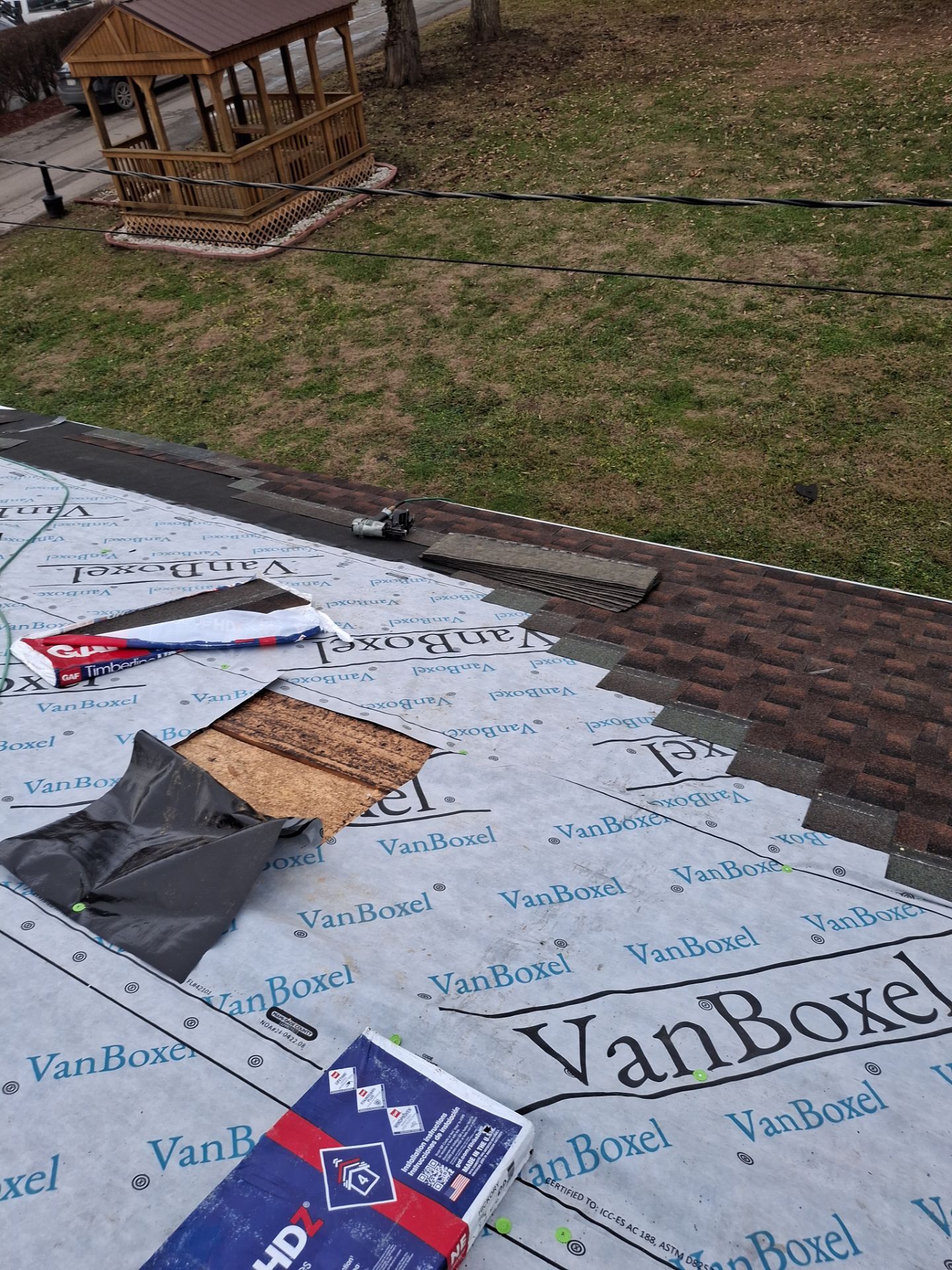 Residential Roofing Installation using GAF TImberline HDZ Hickory by Rainstoppers Roofing