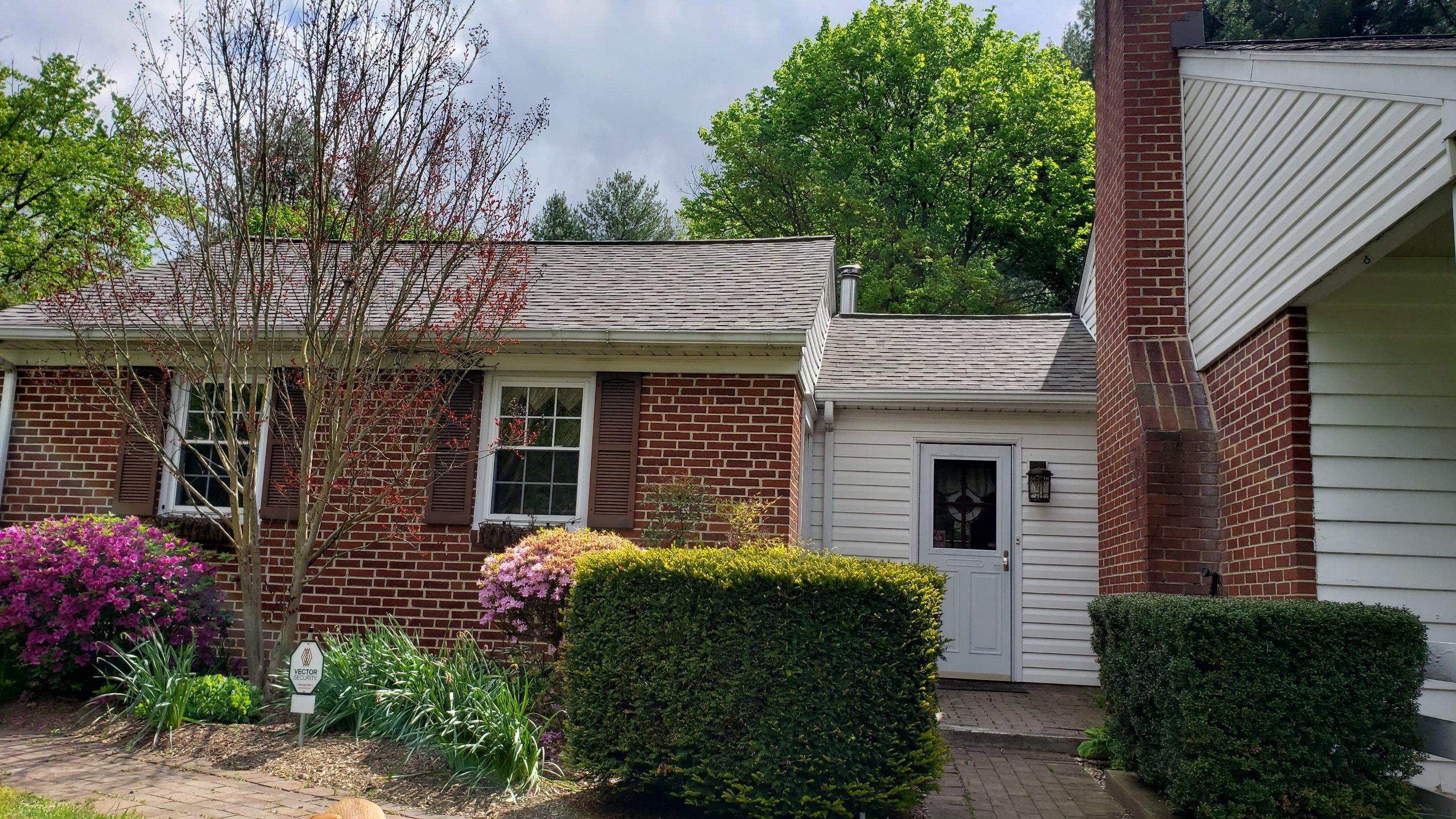 Gutter and Siding Replacement by American Home Contractors