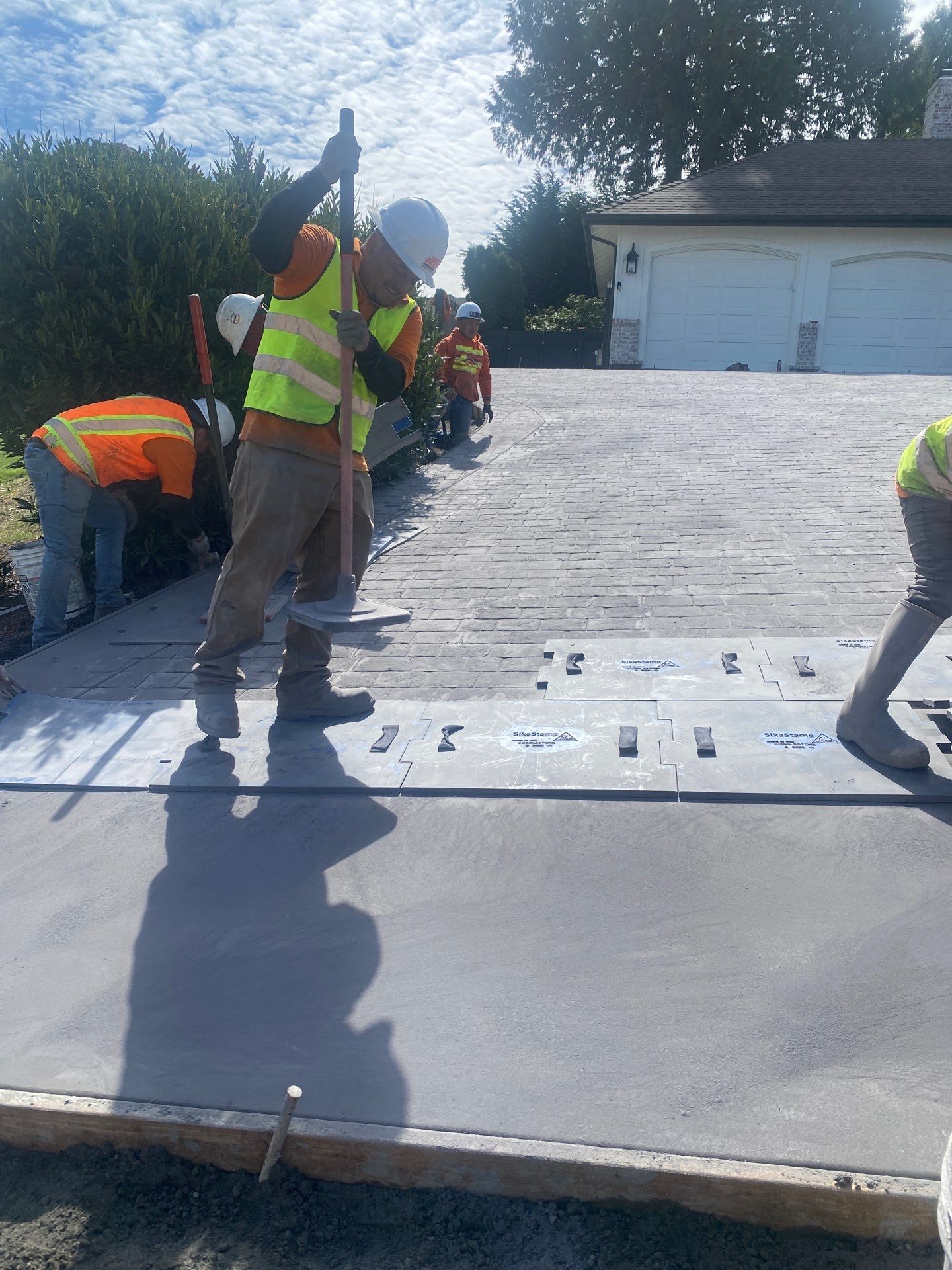 John | Stamped Concrete Driveway Makeover by Jireh Asphalt & Concrete Inc 