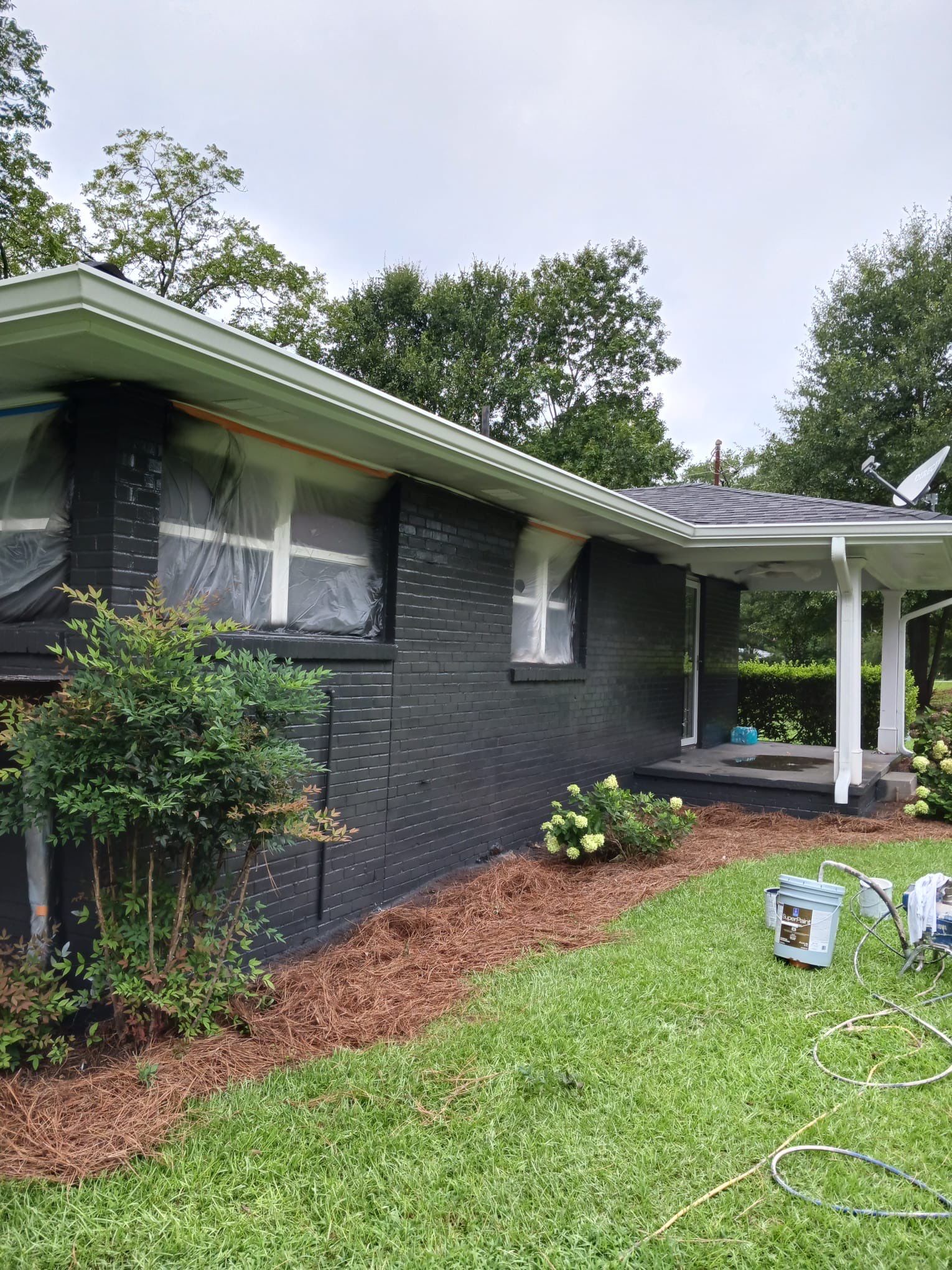 Social Circle Masonry Transformation with Dark Charcoal Exterior Painting by PGP Surface Solutions, LLC