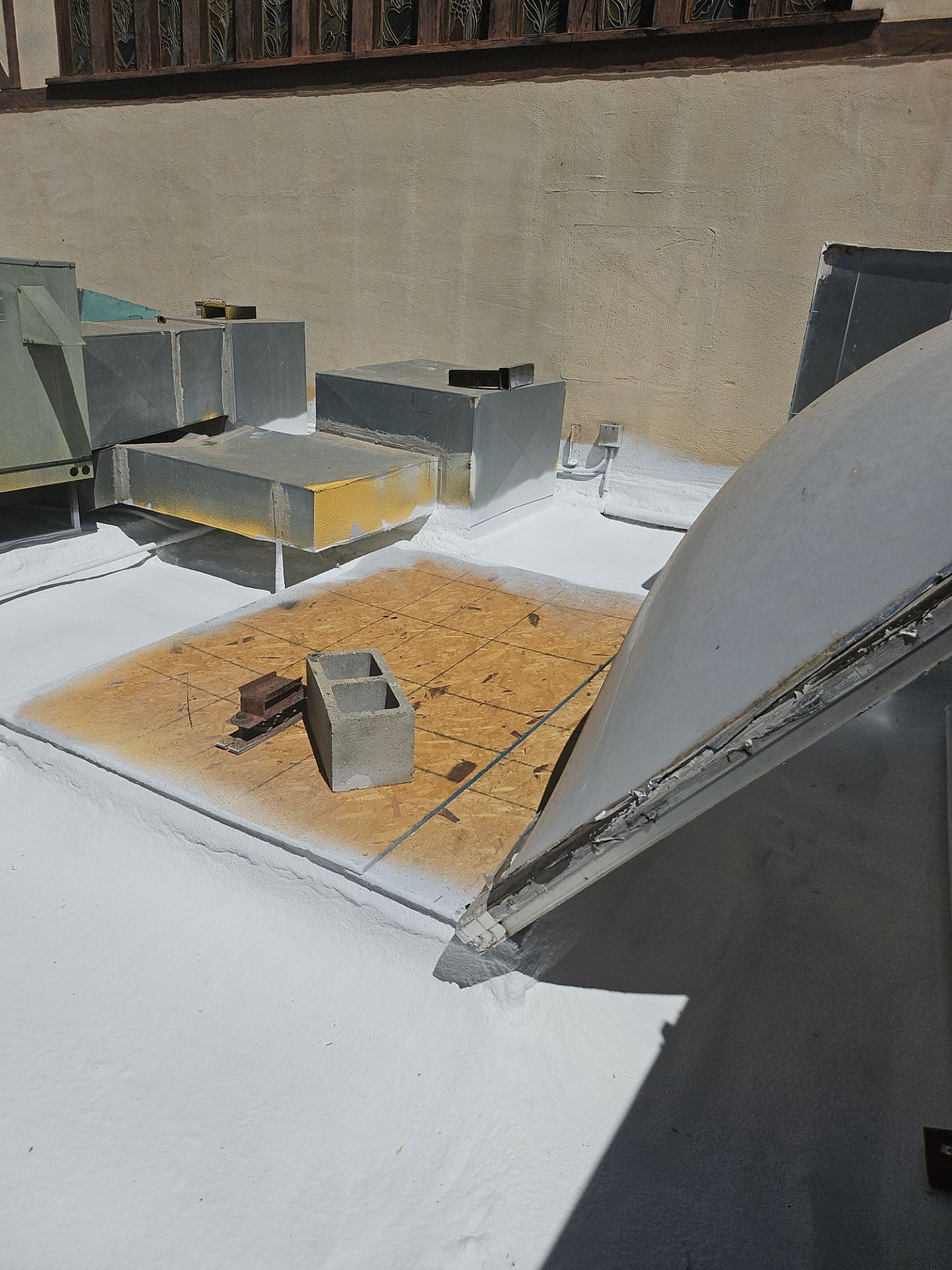 Spray foam and coatings using General Coatings acrylic coatings and spray foam by Straight Edge Roofing Inc