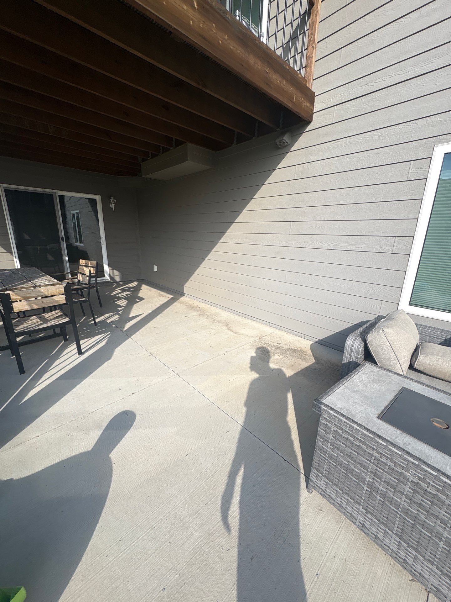 Gray Foundation Painting and Exterior Surface Refresh in Sioux Falls by Select Painting, Coatings & Garage Cabinets
