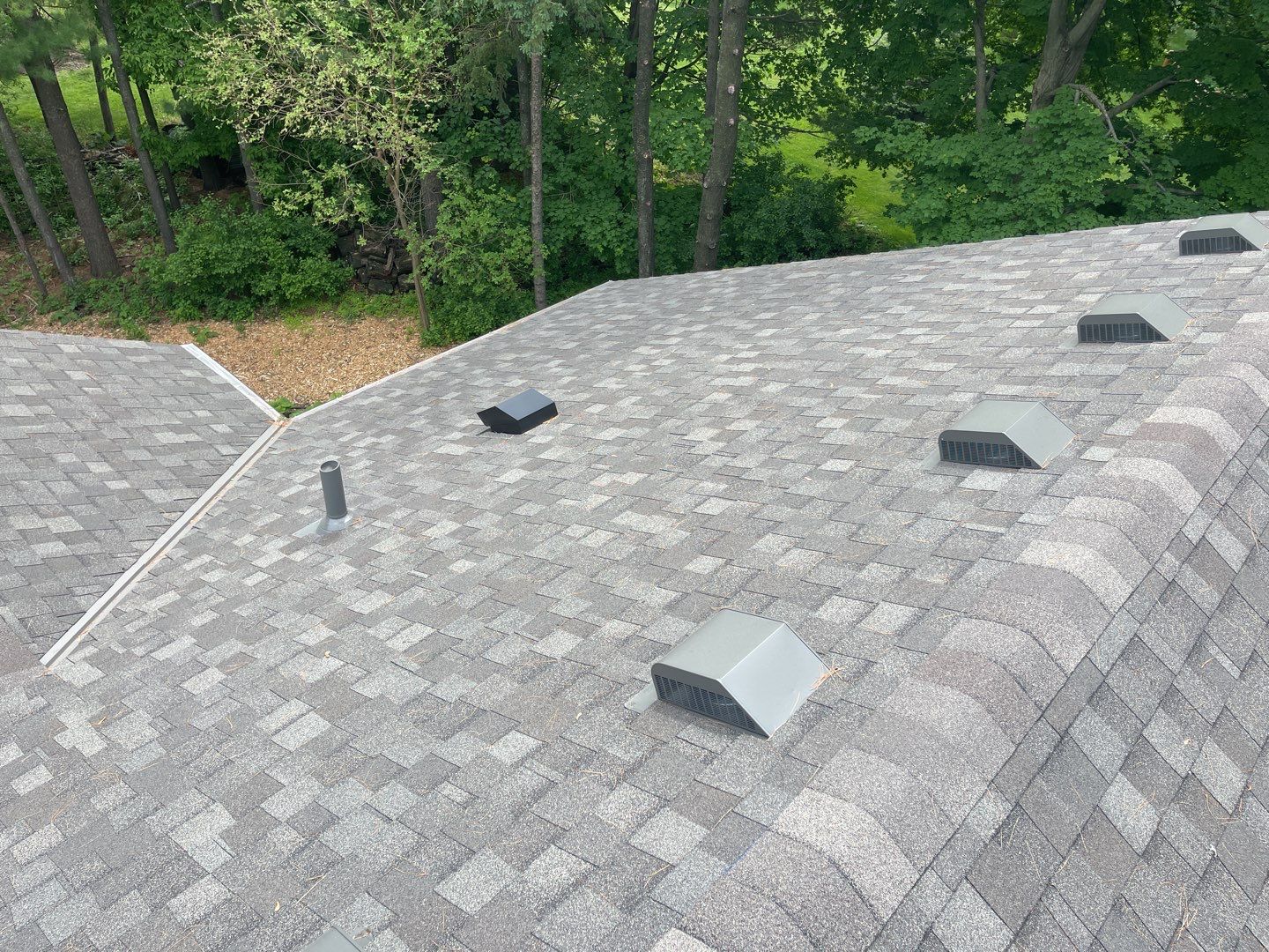 Chanhassen, MN – Roof Replacement with Gutter Guard Upgrade by First Impressions Exteriors