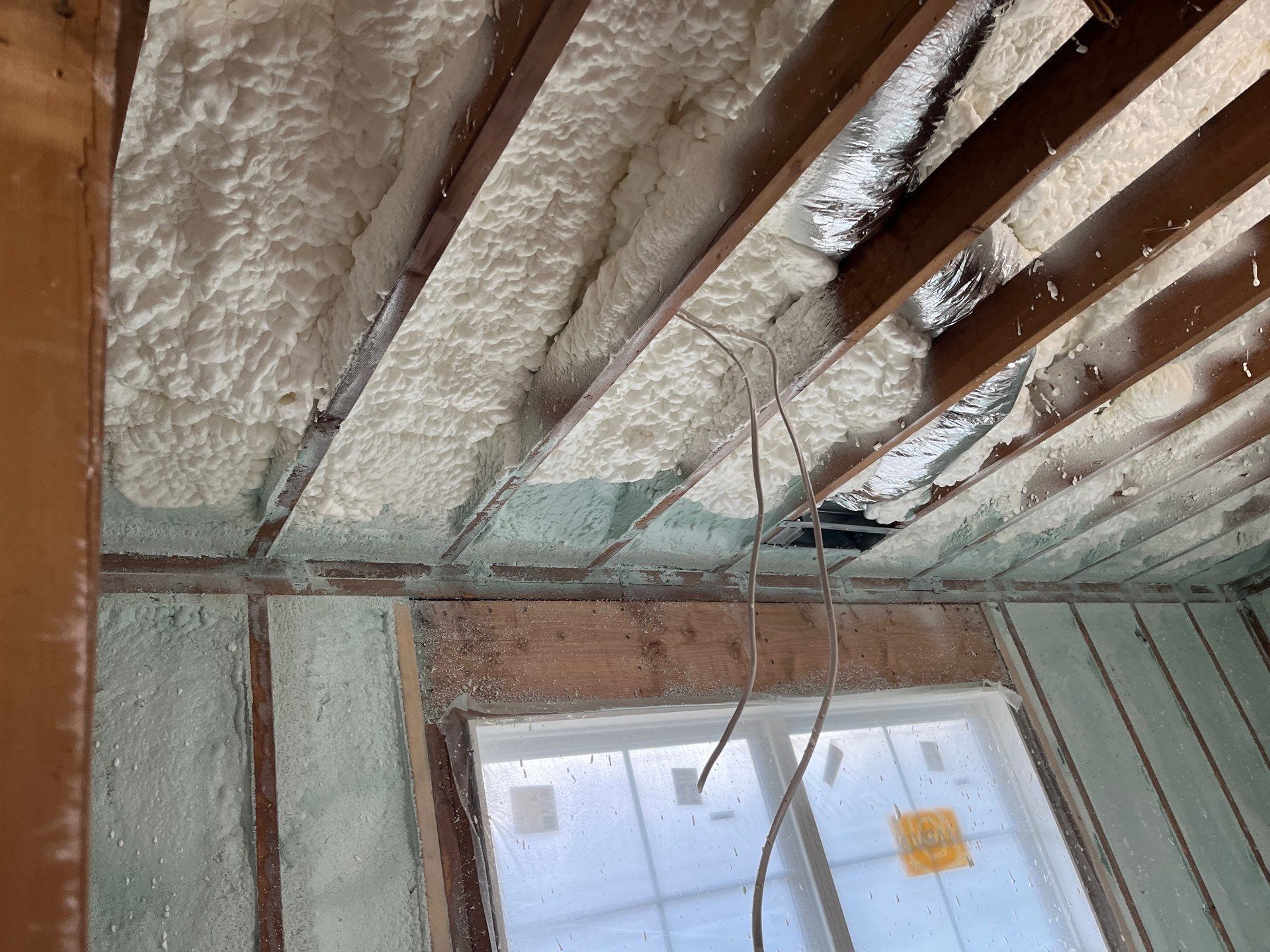 Basement Exterior Walls using Closed Cell Spray Foam by NYS Foam & Energy