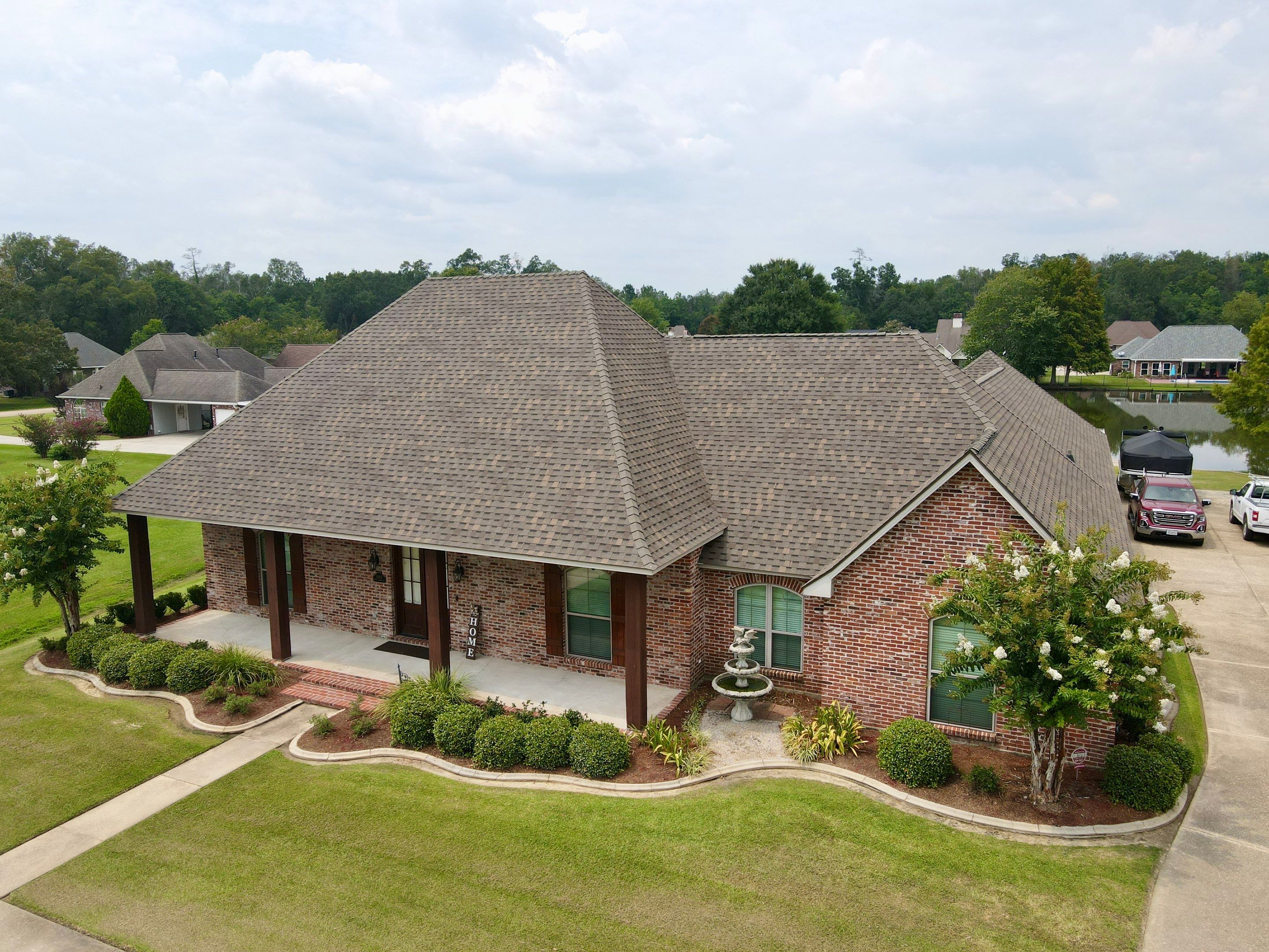 Residential Roofing Installation using Atlas Pinnacle Pristine Weathered Shadow and Atlas High Profile Ridge Cap by Top Team Construction