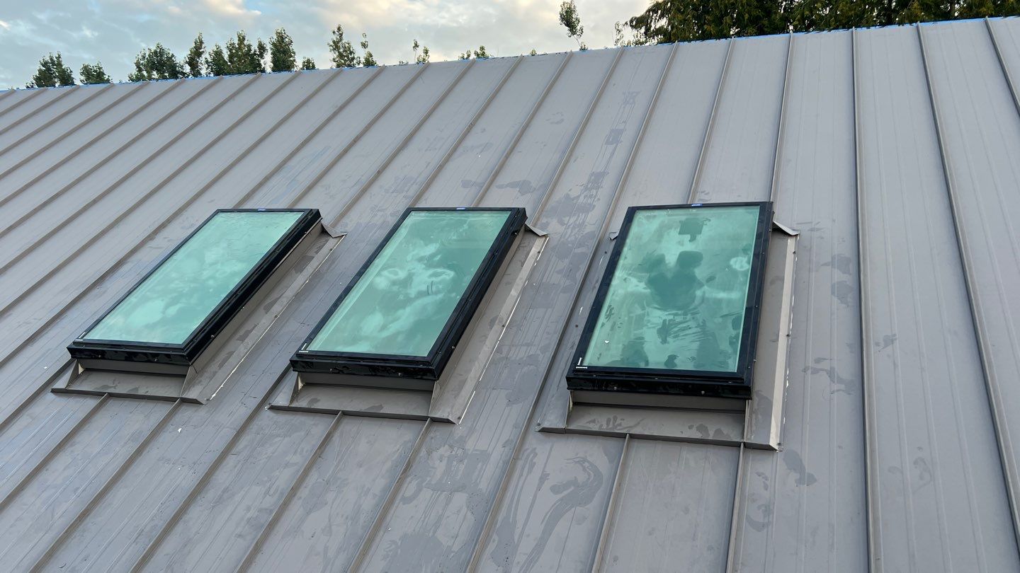 Residential Roofing Installation using multiple products by Top Notch Roofing Inc