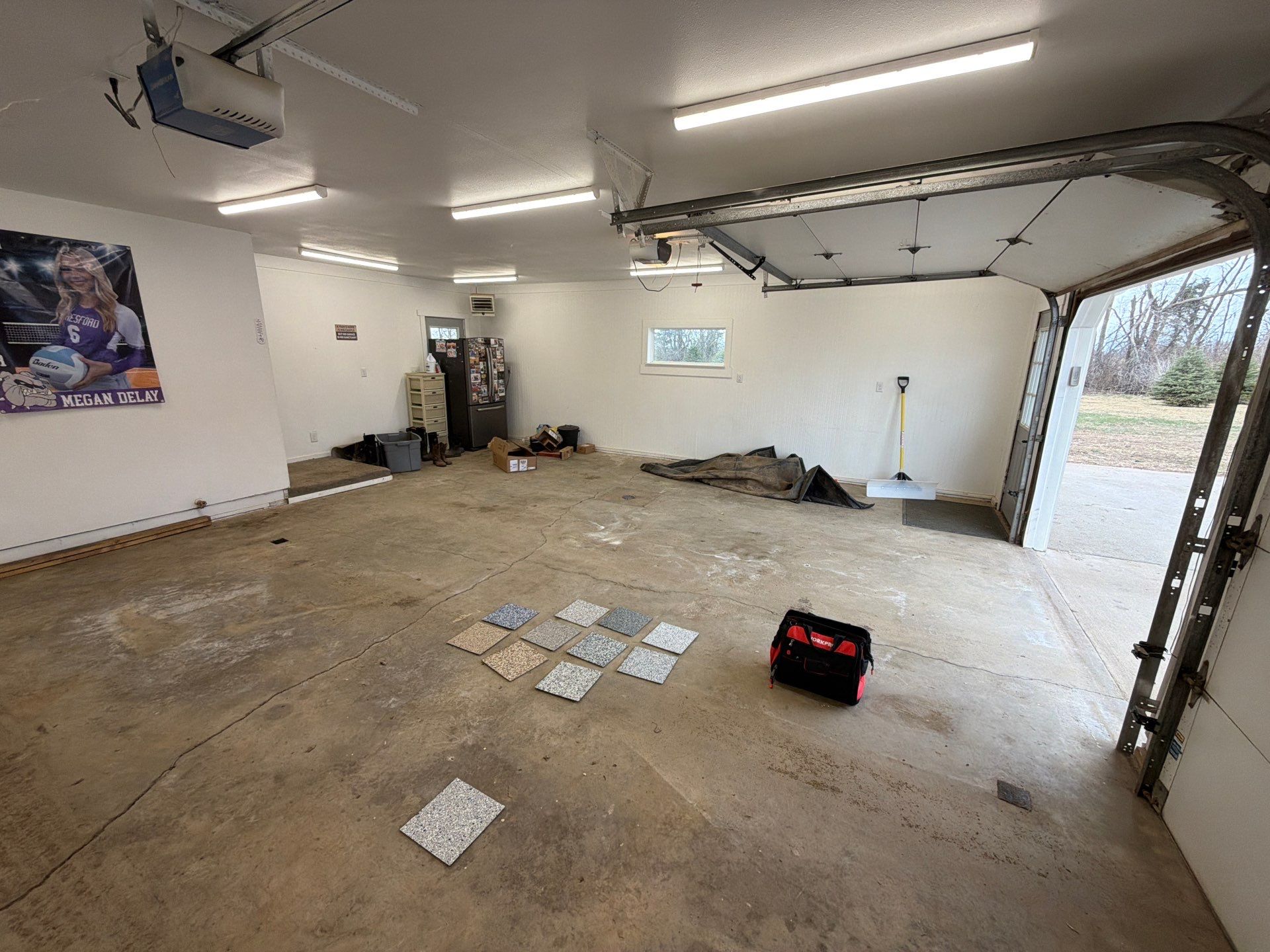 Feather Grey Garage Floor Coating and Crack Repair in Beresford by Select Painting, Coatings & Garage Cabinets