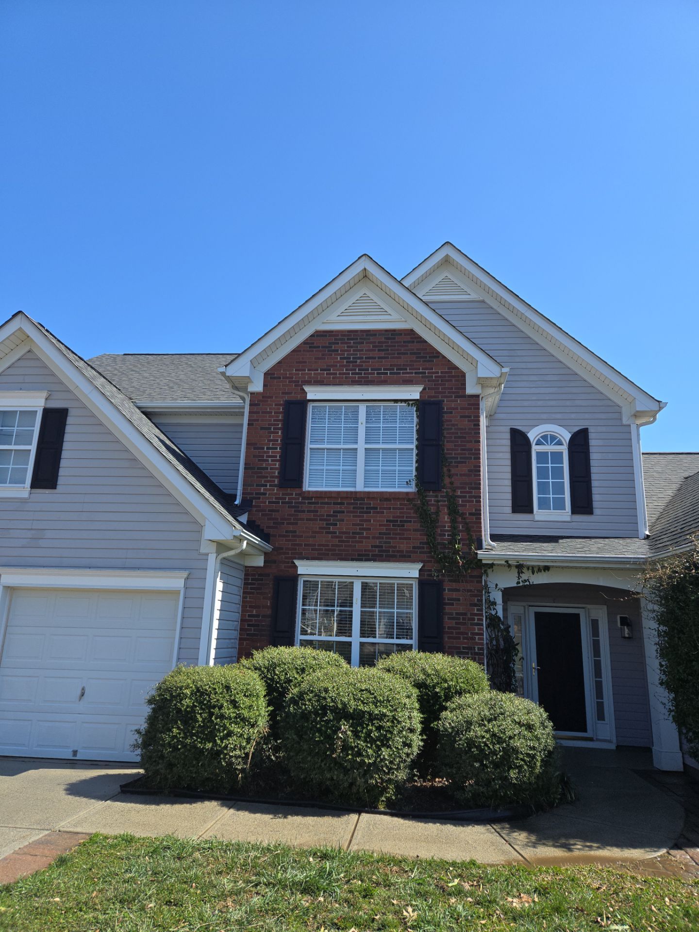 House Wash using cleaner by Power Wash Masters LLC