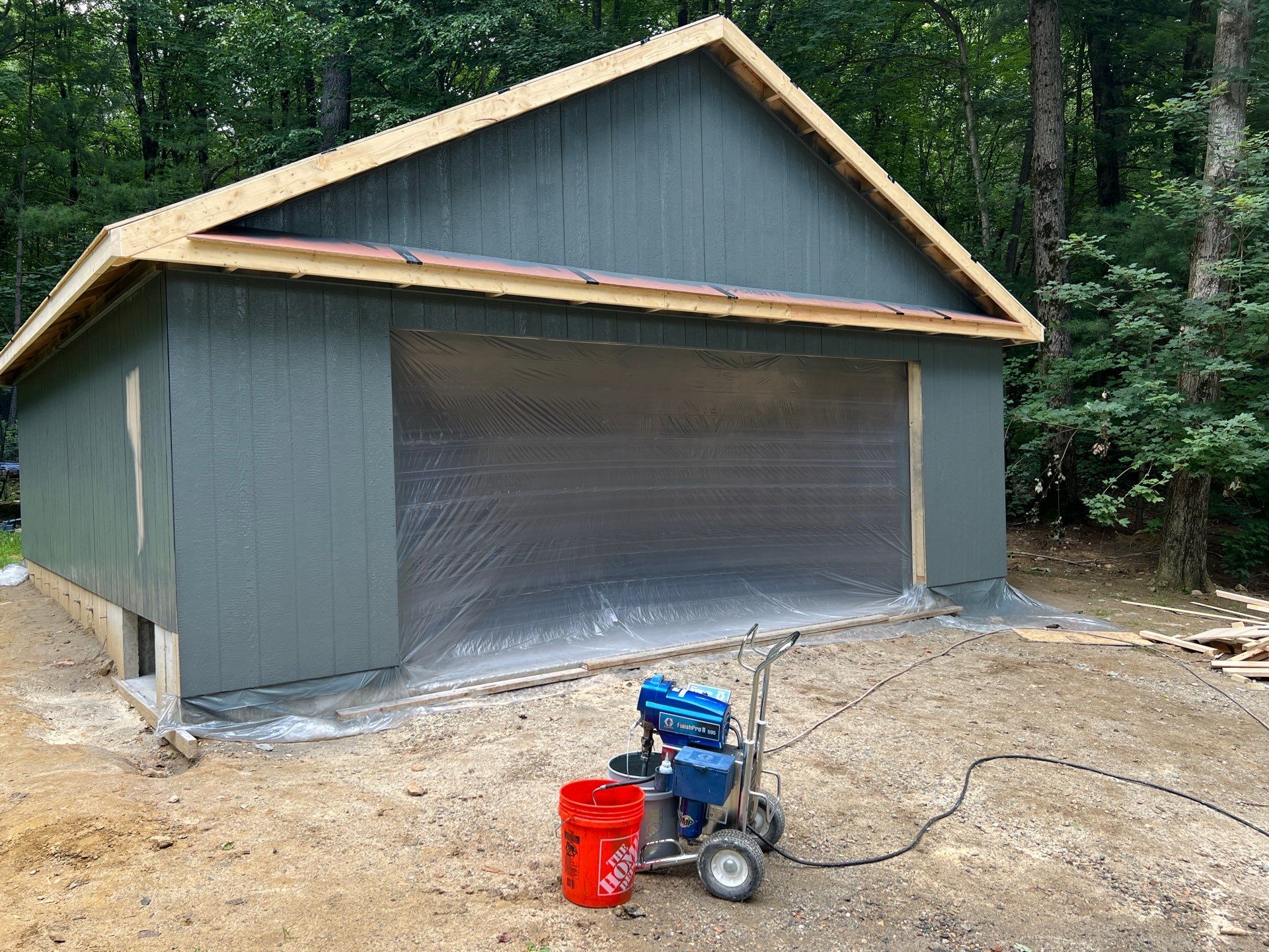 Garage using LP SmartSide Panel Siding by Chagnon Building & Remodeling LLC