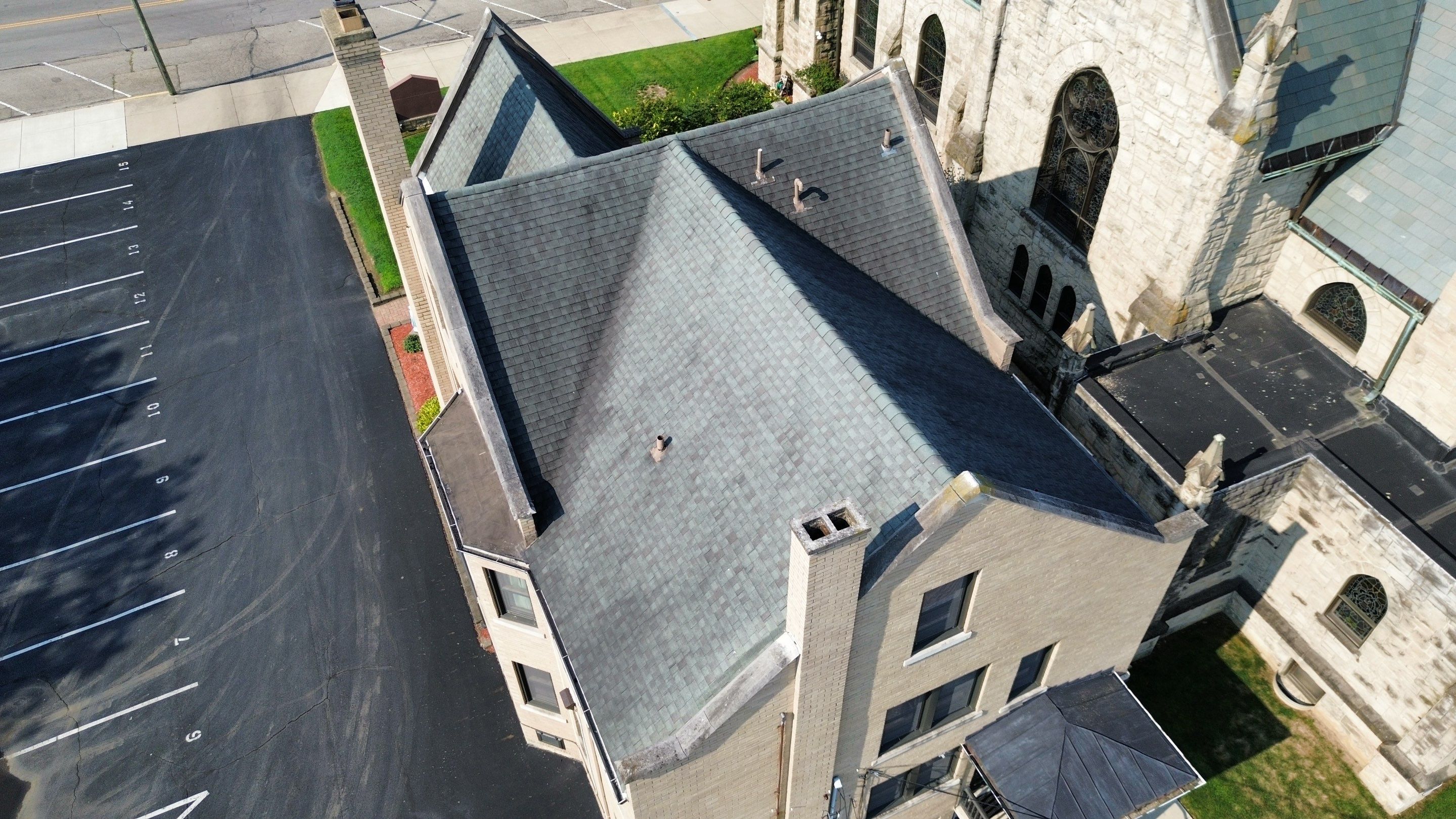 Commercial Roofing Installation using Standing Seam Metal - Frost Black by RoofX 