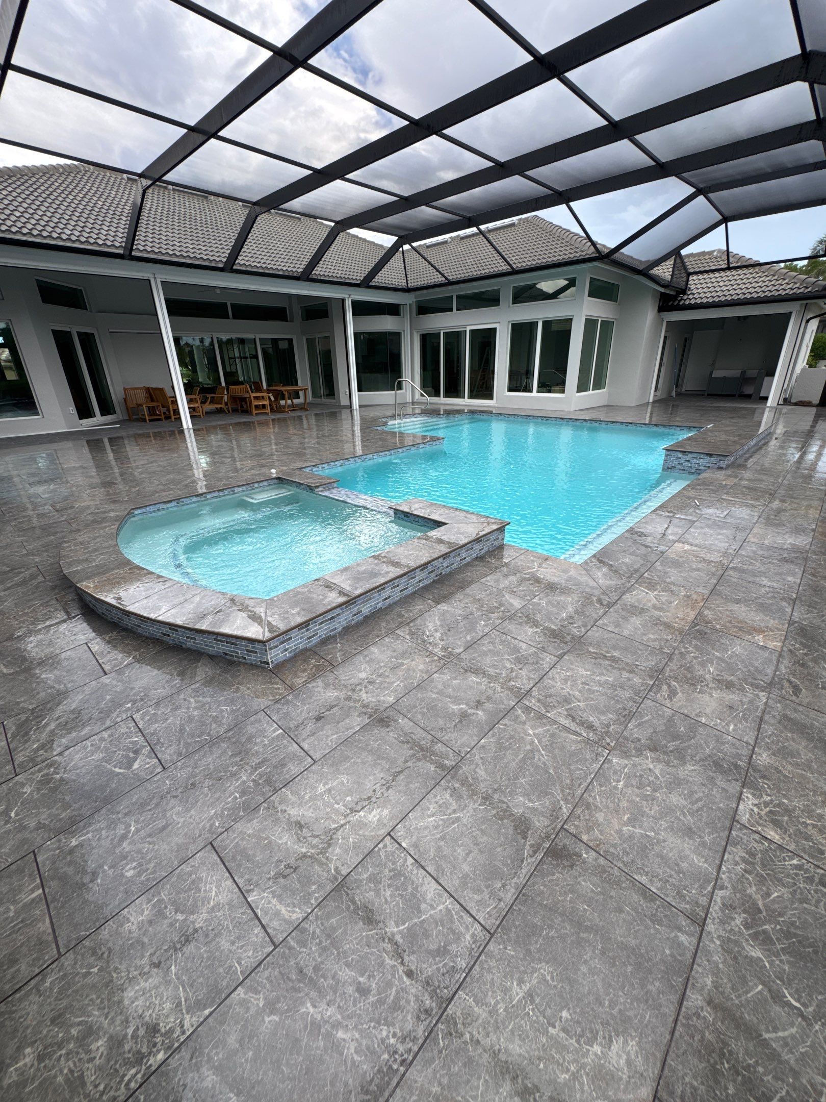 Pool Renovation/Porcelain pavers/Wild Cat Run by Old Town Pavers Llc
