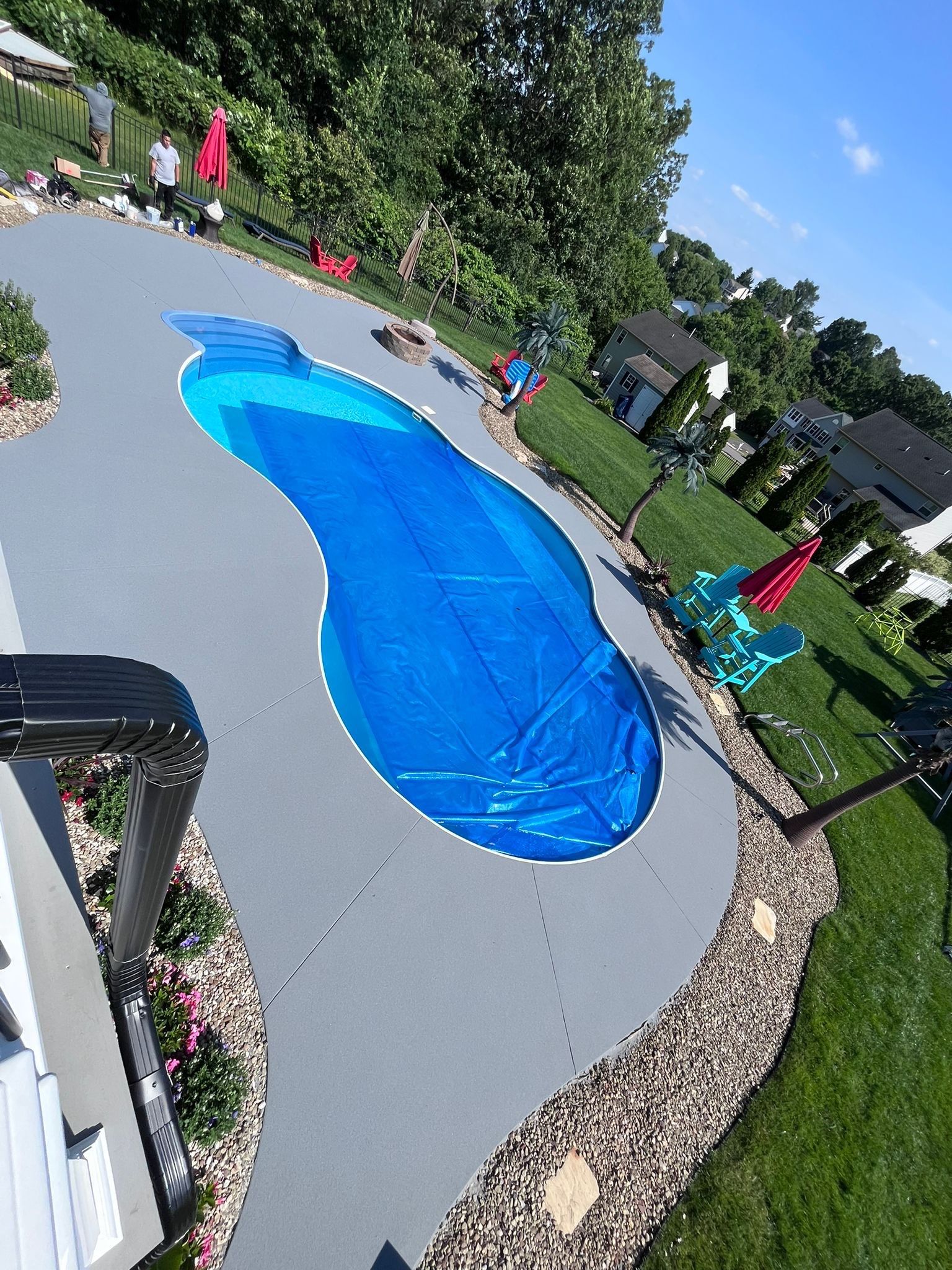 Twilight Pool Deck / Patio Project in Beaver falls by Floors in a Day, Inc