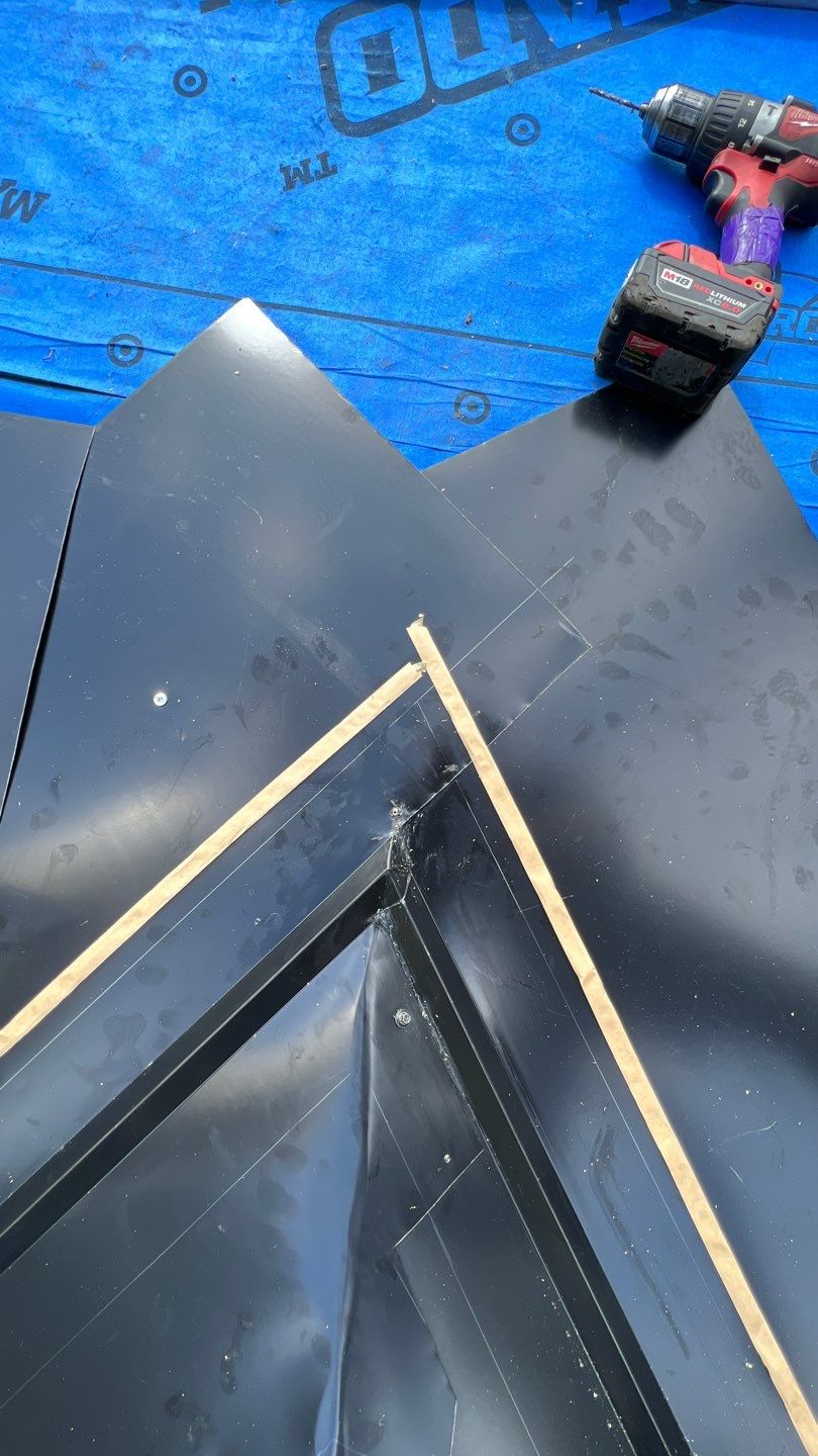 Residential ReRoofing Installation using 12" Prolok metal by Top Notch Roofing Inc