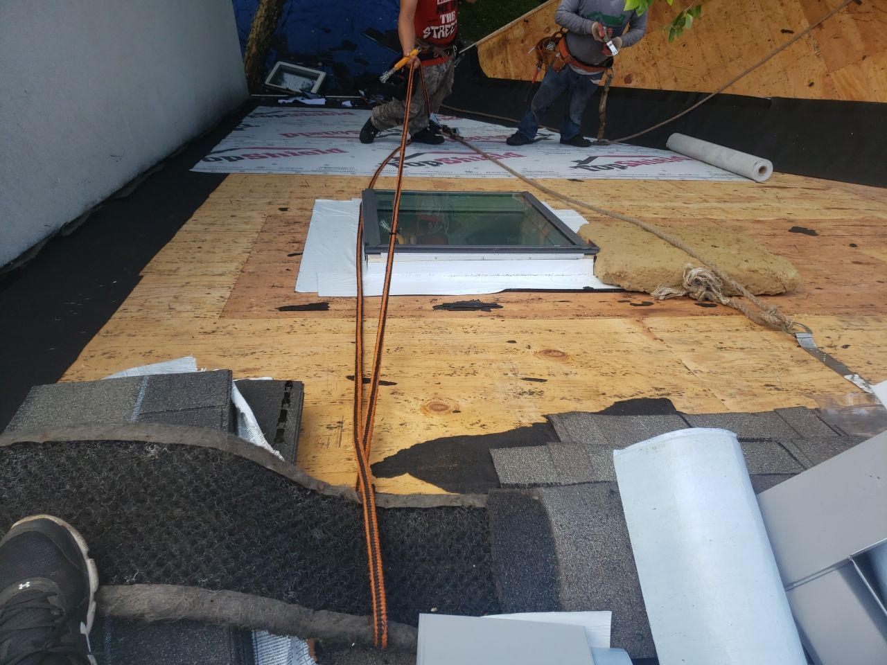 Skylight, Roof, and Gutter Replacement by American Home Contractors