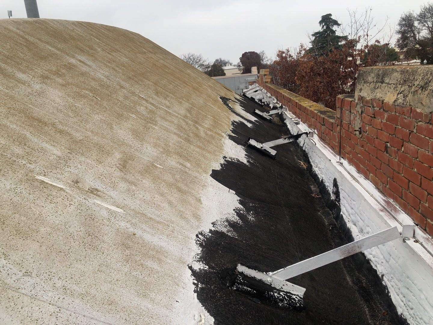 Spray foam and coatings using Conklin Benchmark/PUMA XL coatings and spray foam by Straight Edge Roofing Inc