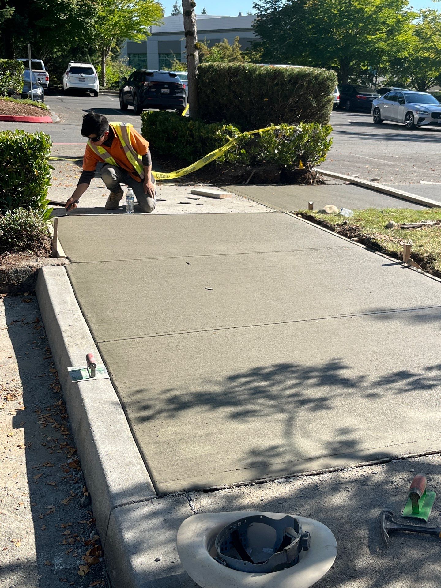 Kidder Matthews | Parking Lot Sealcoating & Striping with Concrete Curb & Patch Repairs  by Jireh Asphalt & Concrete Inc 