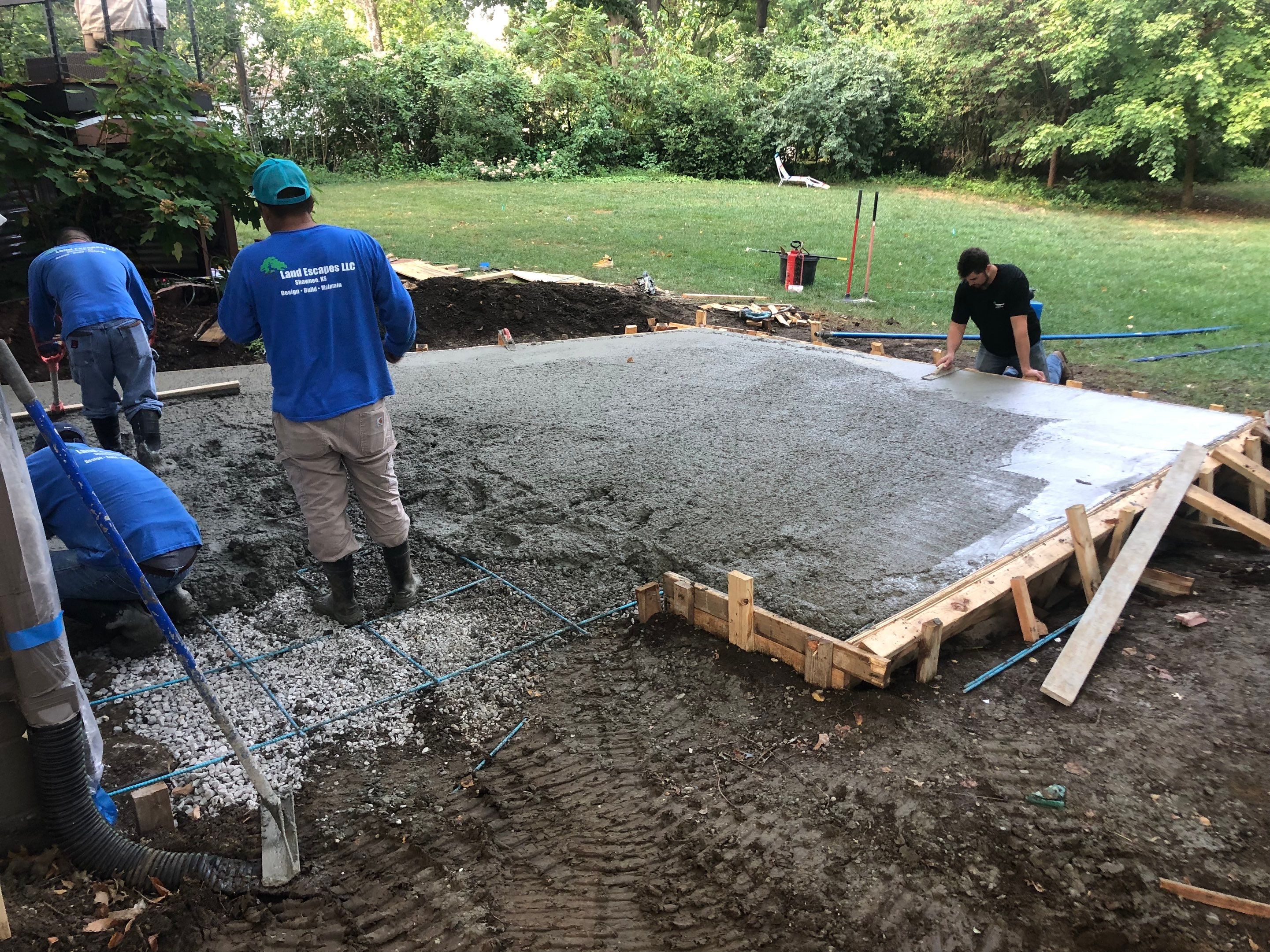 Back Yard Cantilivered Patio by LAND ESCAPES LLC
