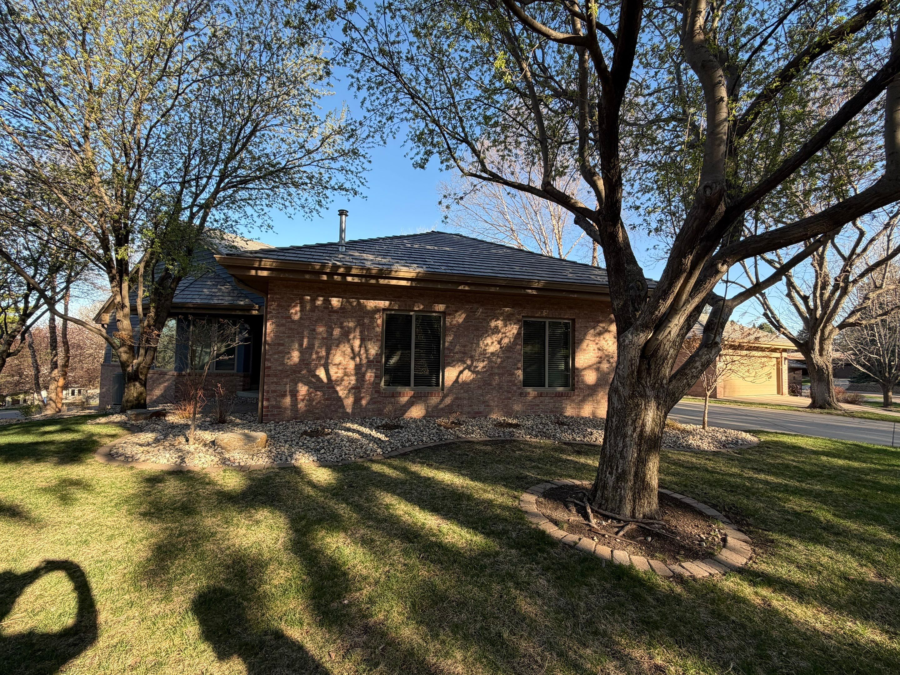 Residential Exterior Painting and Siding Refresh in Sioux Falls by Select Painting, Coatings & Garage Cabinets