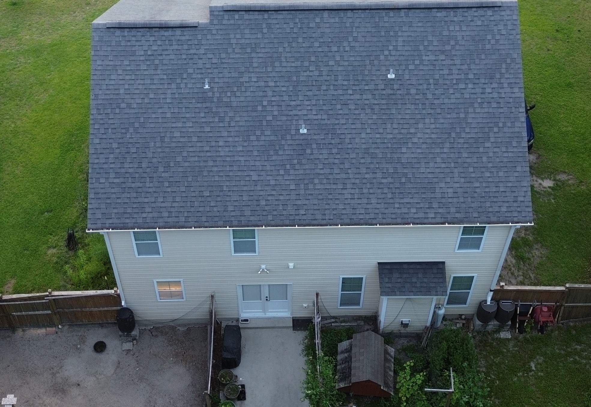 Moire Black Roof Replacement in Jacksonville, NC by RGR Construction and Roofing, LLC