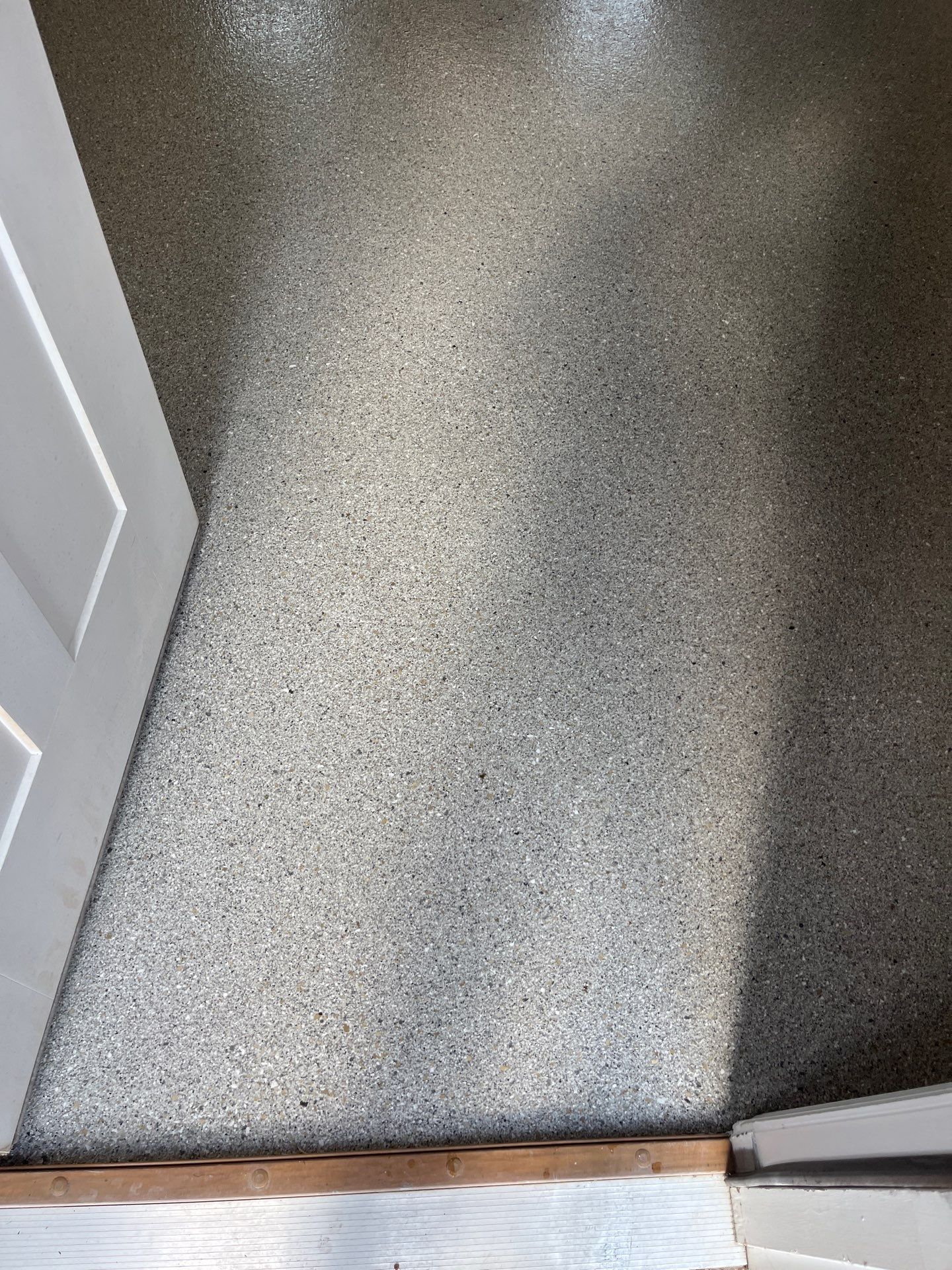 Basement Floor Coating using Quartzite by My Garage Floor Guys