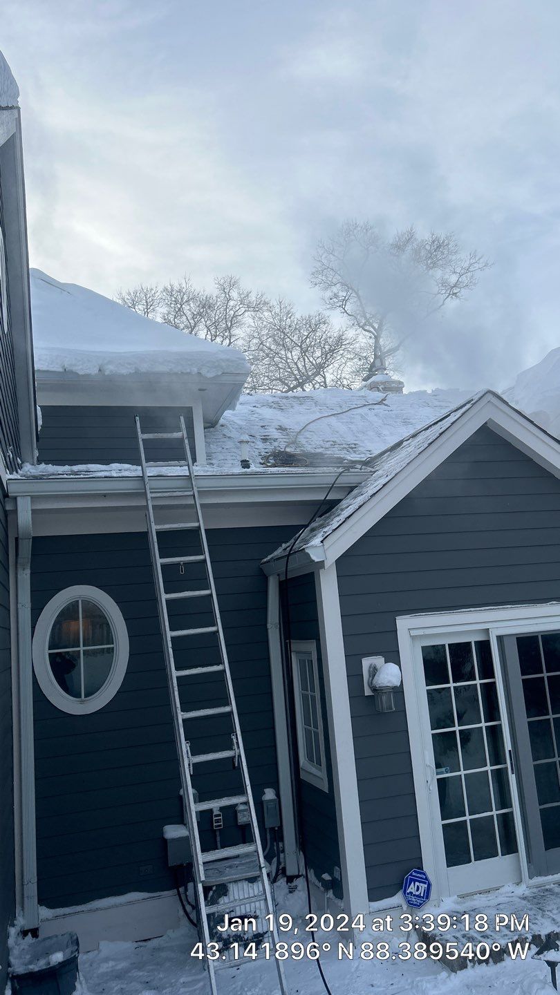 Roof Snow And Ice Dam Removal using Steamer by Total Restoration Services