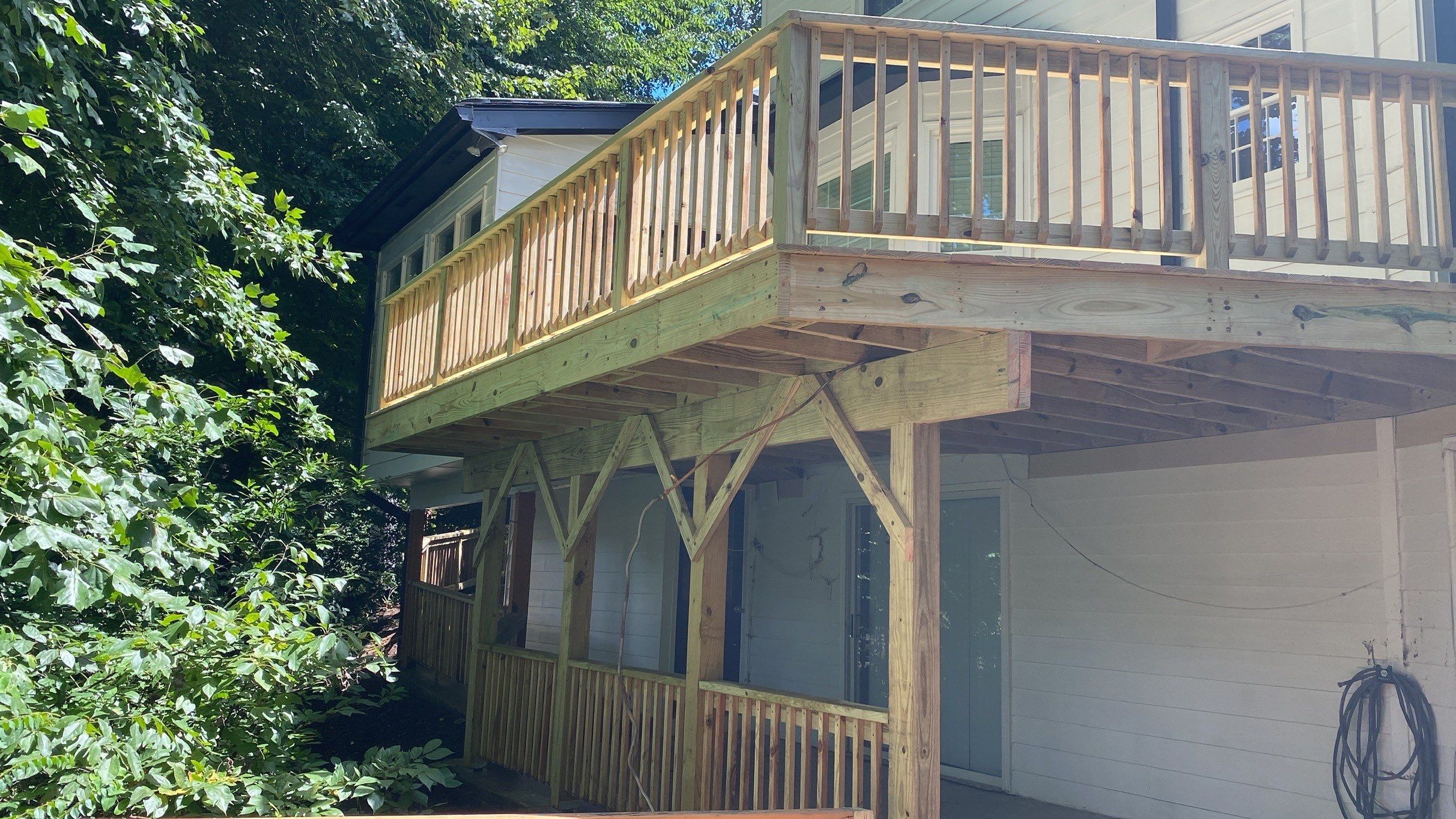 Elevated Wood Deck and Covered Patio Installation in Alpharetta by Swift Home Renovations