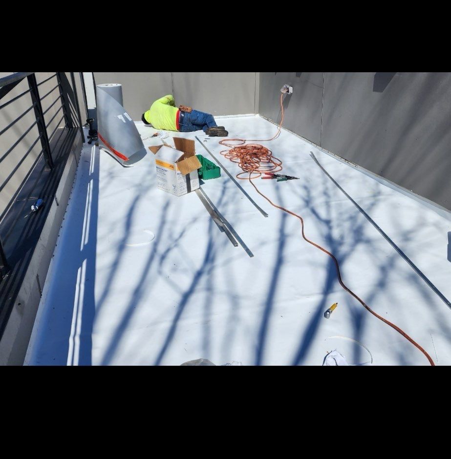 Commercial Roofing Installation using firestone TPO by Nailed It Roofing & Remodeling LLC