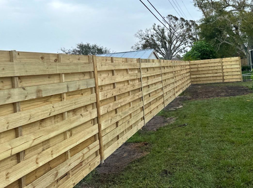 Wood Fence Installation using 6Ft Tall Pressure Treated Wood Privacy Fence by Asap fence and gates, LLC