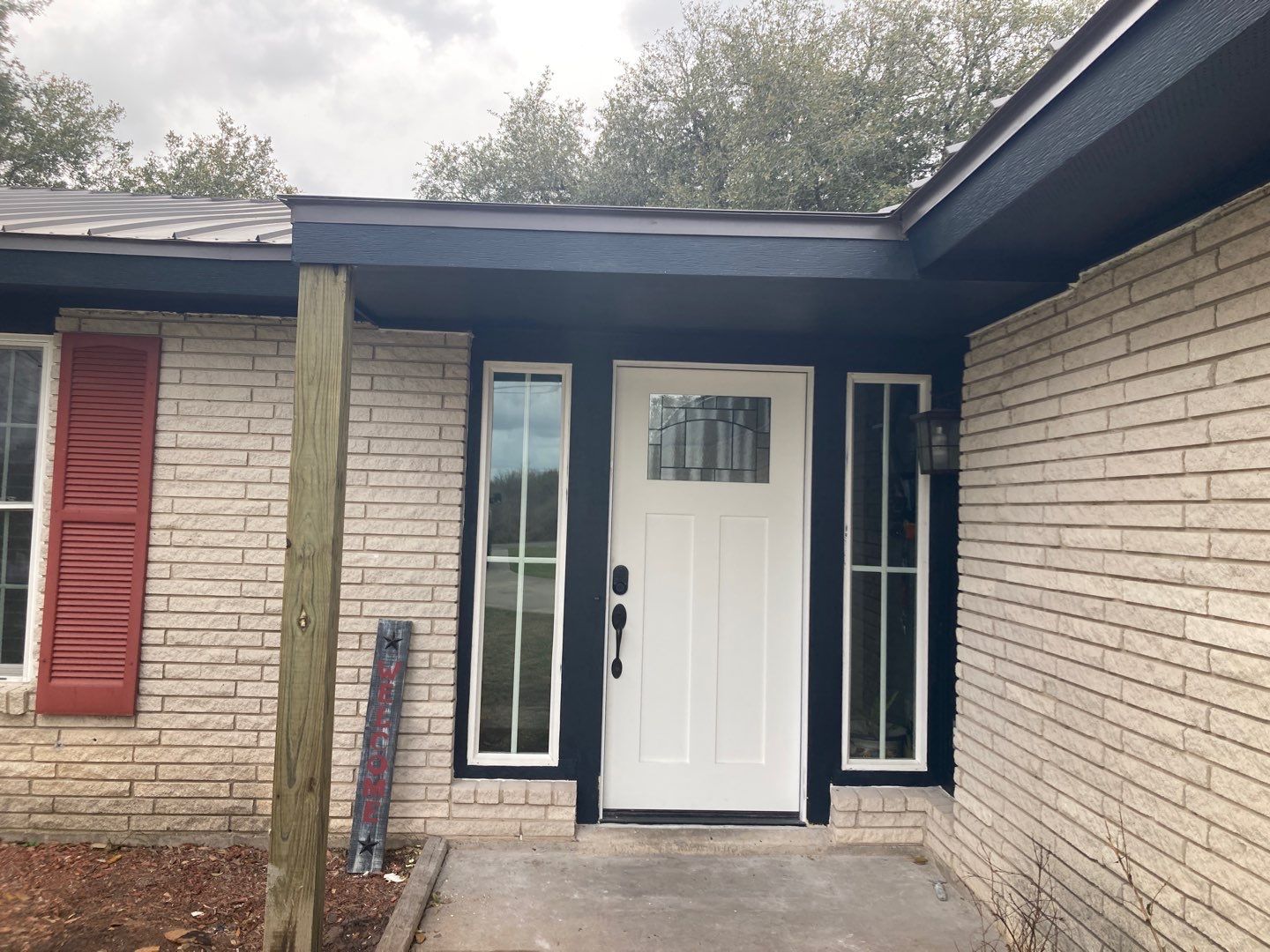 Beeville Backporch sittin' by Bayfront Roofing and Construction