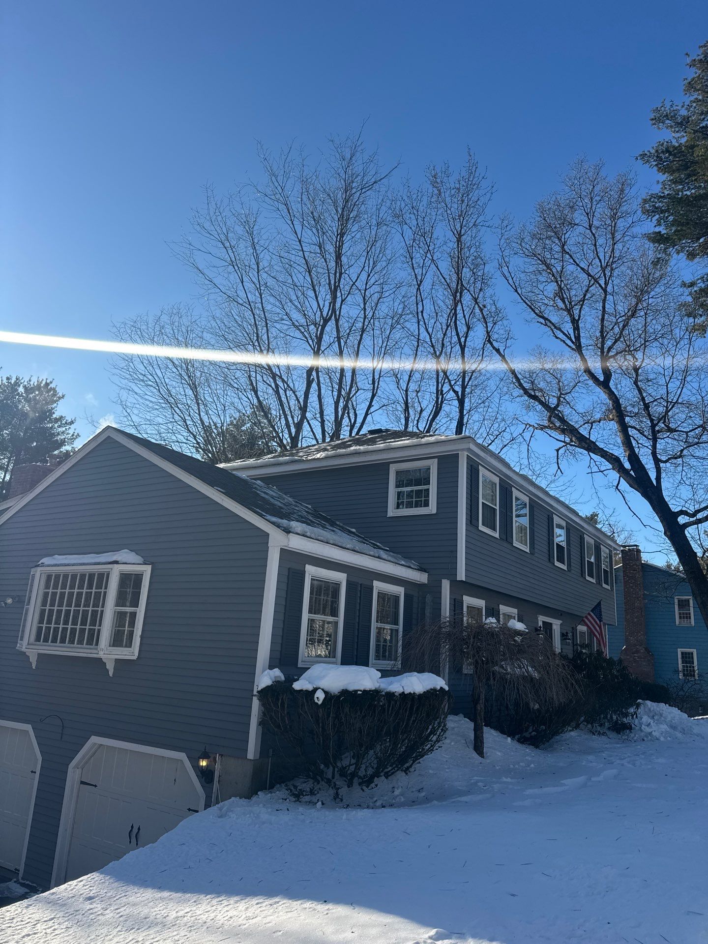 Ice Dam Removal & Snow Removal in Acton, MA by Mighty Dog Roofing of Greater Middlesex County