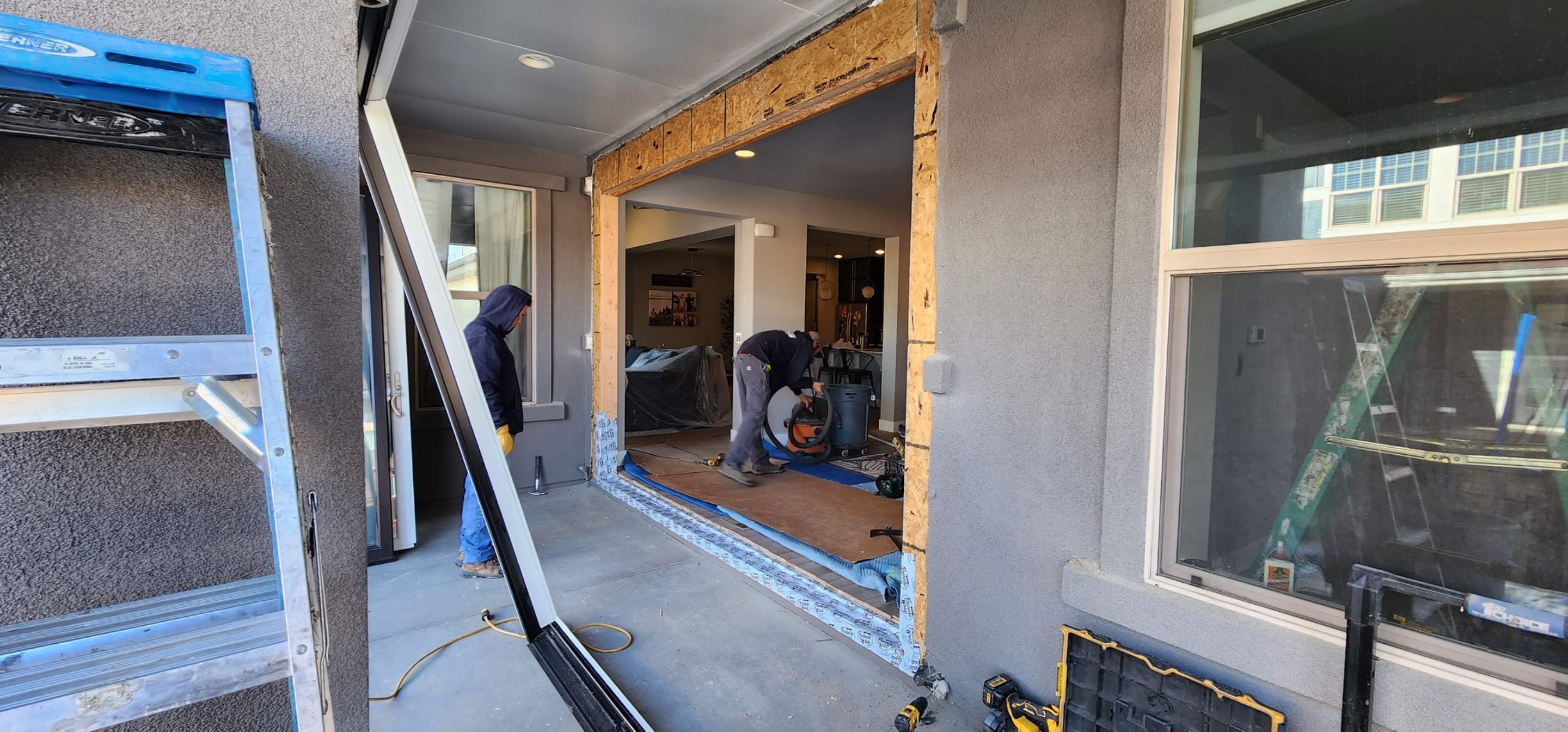 Open your space up to the outside! 4 Panel Patio door replacing 2 windows by 1st choice windows and siding