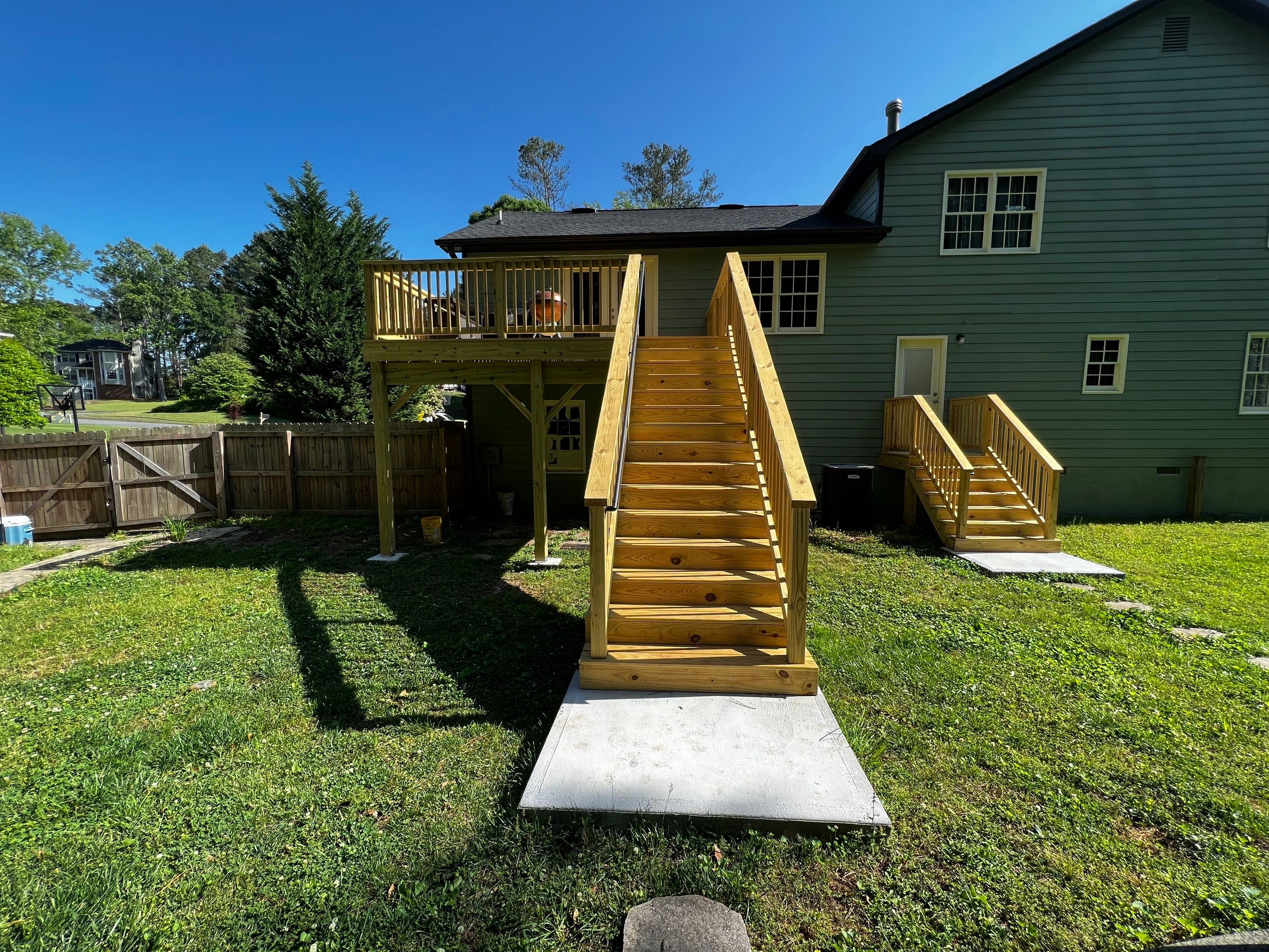 Elevated Pressure-Treated Wood Deck Replacement in Marietta by Swift Home Renovations
