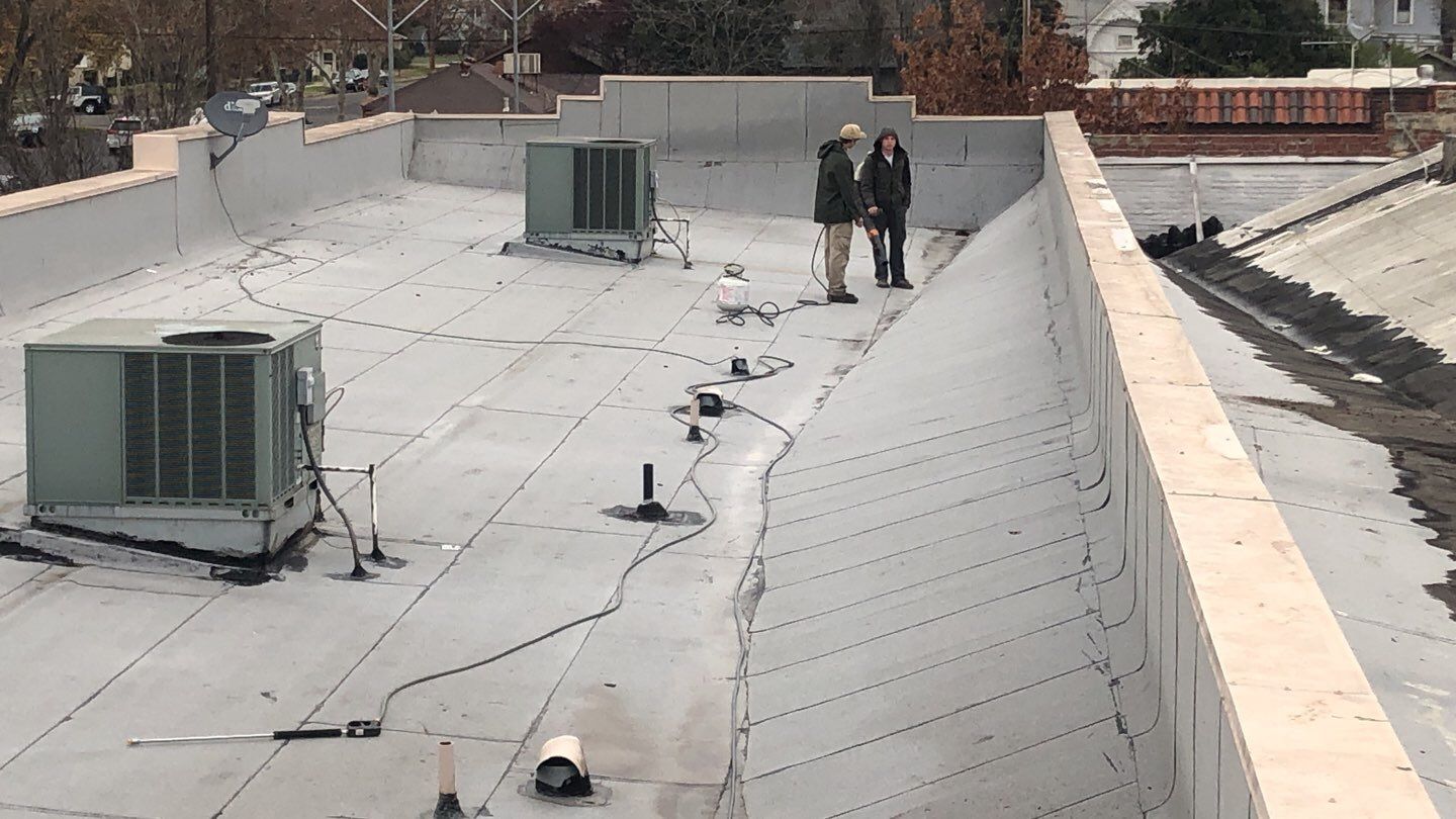 Spray foam and coatings using Conklin Benchmark/PUMA XL coatings and spray foam by Straight Edge Roofing Inc